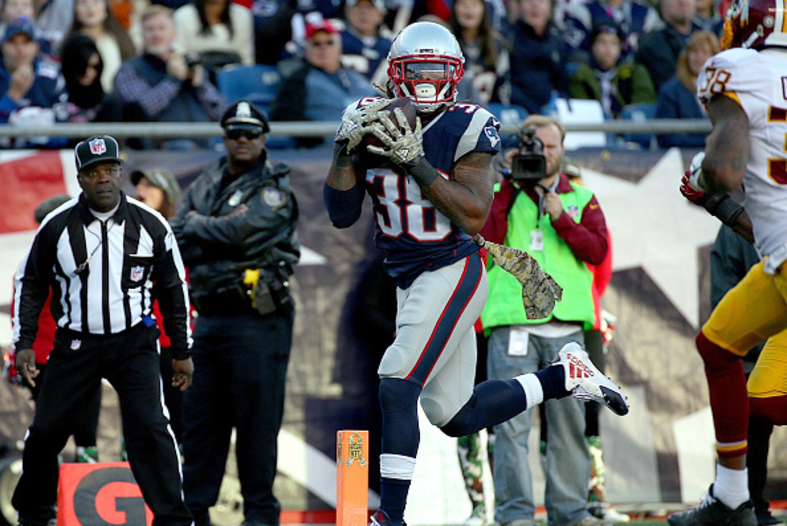 FOXBORO, MA - NOVEMBER 8: Brandon Bolden #38 of the New England Patriots catches a touchdown pass as Dashon Goldson #38 of the Washington Redskins defends in the second half at Gillette Stadium on November 8, 2015 in Foxboro, Massachusetts. (Photo by Jim 