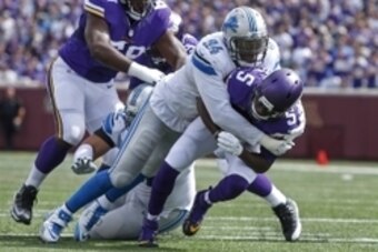Sep 20, 2015; Minneapolis, MN, USA; Detroit Lions defensive end Ezekiel Ansah (94) sacks Minnesota Vikings quarterback Teddy Bridgewater (5) in the second quarter at TCF Bank Stadium. The Vikings win 26-16. Mandatory Credit: Bruce Kluckhohn-USA TODAY Spor