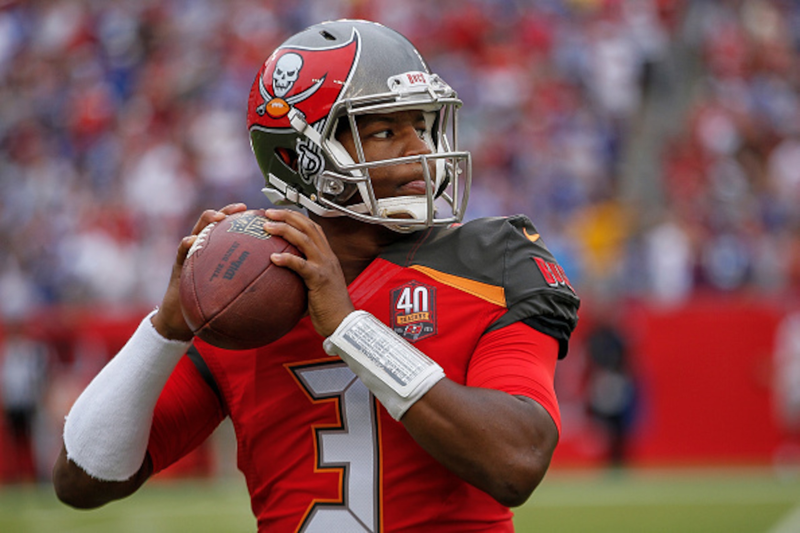 TAMPA, FL - NOVEMBER 8: Quarterback Jameis Winston #3 of the Tampa Bay Buccaneers warms up on the sidelines during the game against the New York Giants at Raymond James Stadium on November 8, 2015 in Tampa, Florida. The Giants defeated the Buccaneers 32 t