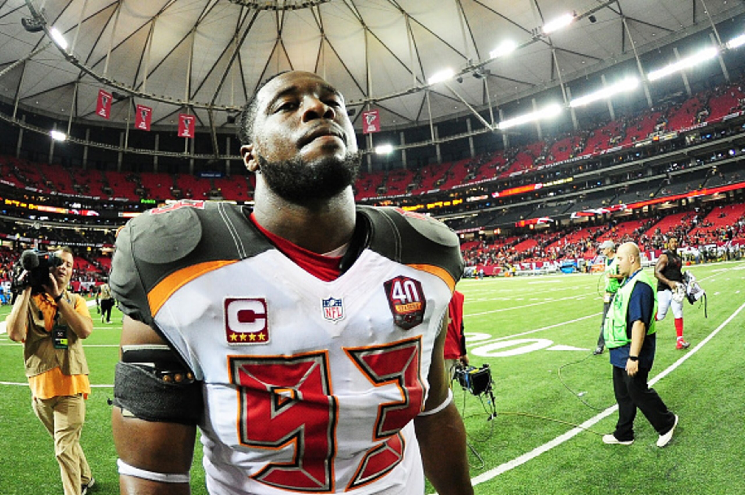 ATLANTA, GA - NOVEMBER 01:  Gerald McCoy #93 of the Tampa Bay Buccaneers walks off the field after beating the Atlanta Falcons in overtime at the Georgia Dome on November 1, 2015 in Atlanta, Georgia.  (Photo by Scott Cunningham/Getty Images)