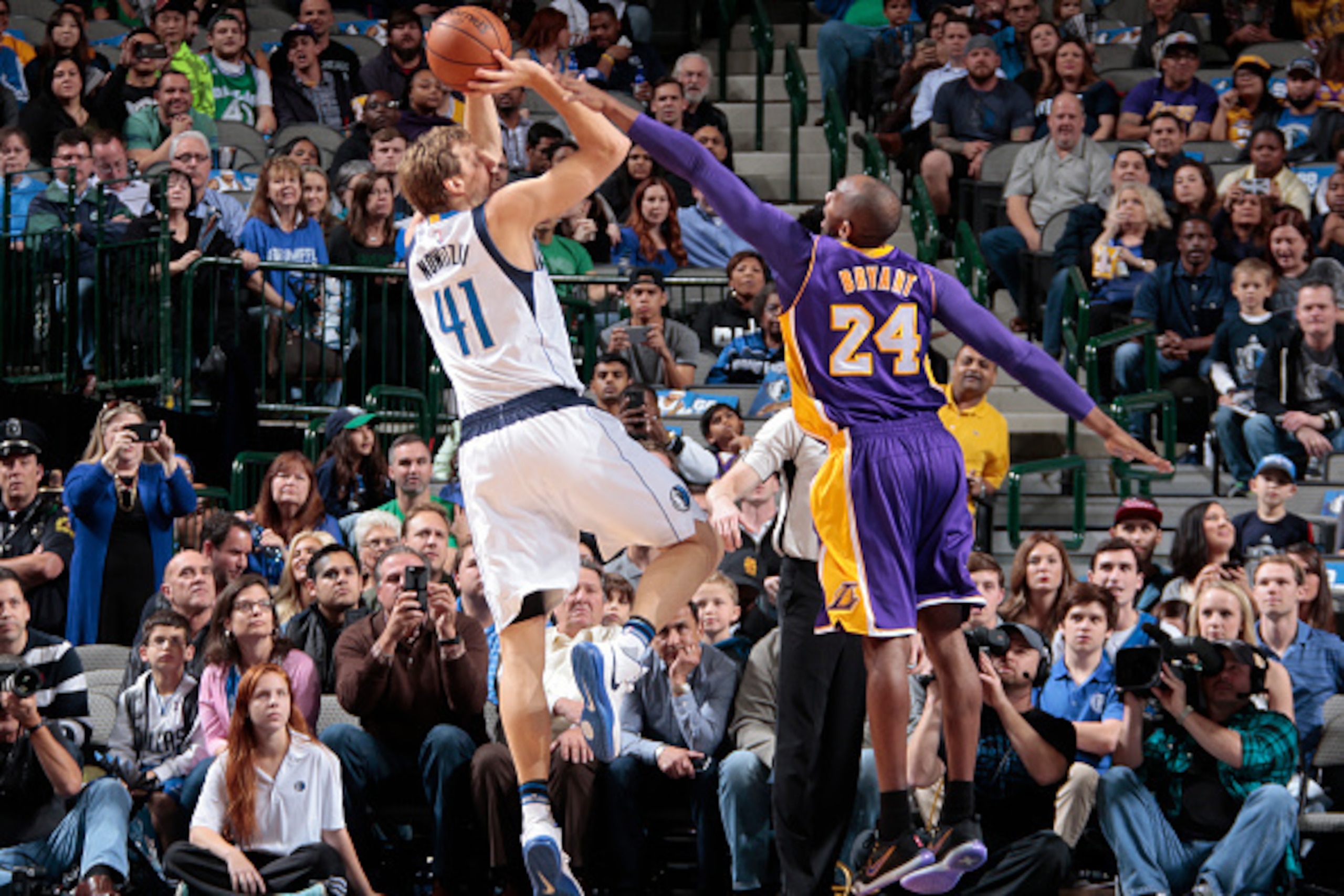 DALLAS, TX - NOVEMBER 13: Dirk Nowitzki #41 of the Dallas Mavericks shoots the ball against Kobe Bryant #24 of the Los Angeles Lakers during the game on November 13, 2015 at the American Airlines Center in Dallas, Texas. NOTE TO USER: User expressly ackno