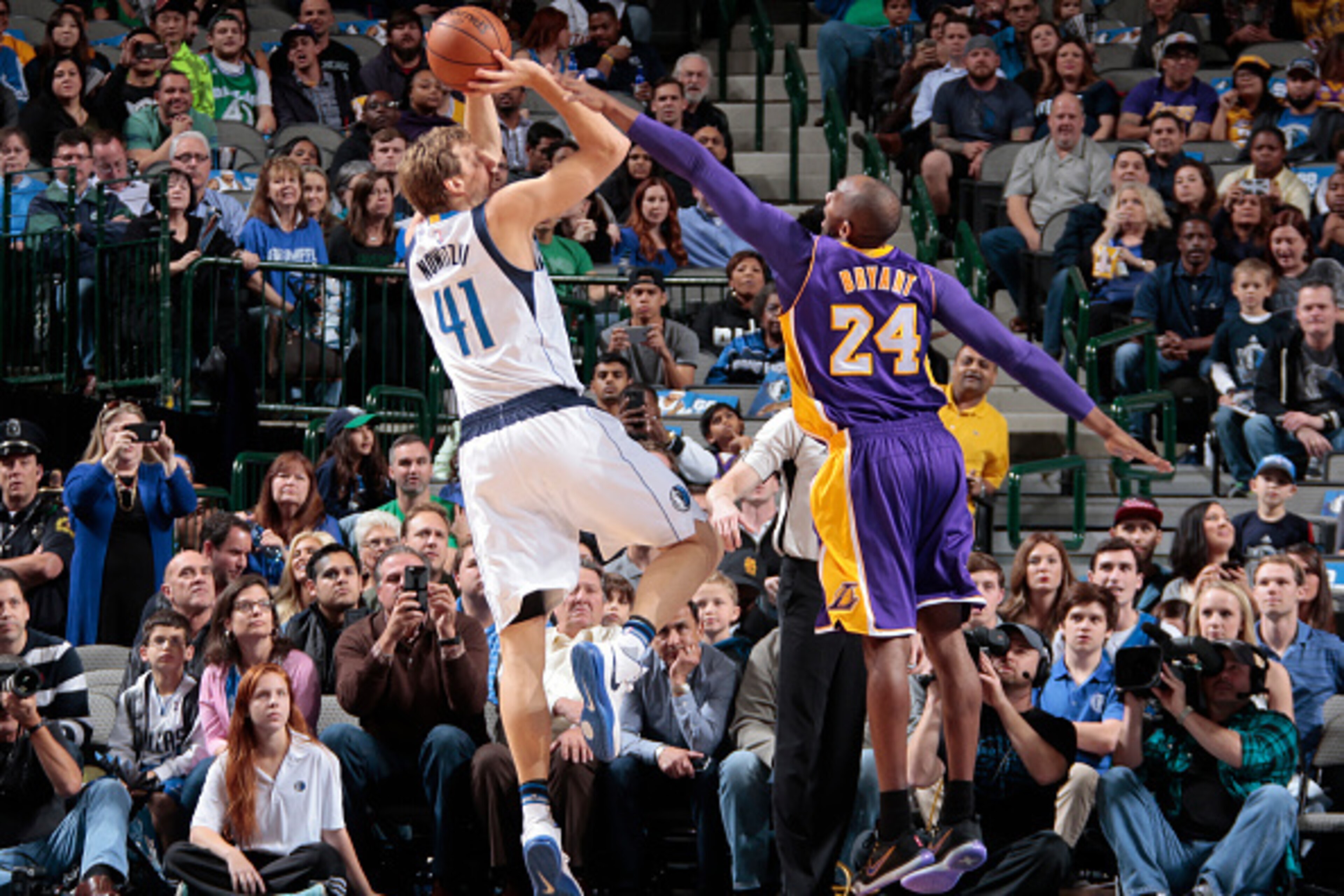 DALLAS, TX - NOVEMBER 13: Dirk Nowitzki #41 of the Dallas Mavericks shoots the ball against Kobe Bryant #24 of the Los Angeles Lakers during the game on November 13, 2015 at the American Airlines Center in Dallas, Texas. NOTE TO USER: User expressly ackno