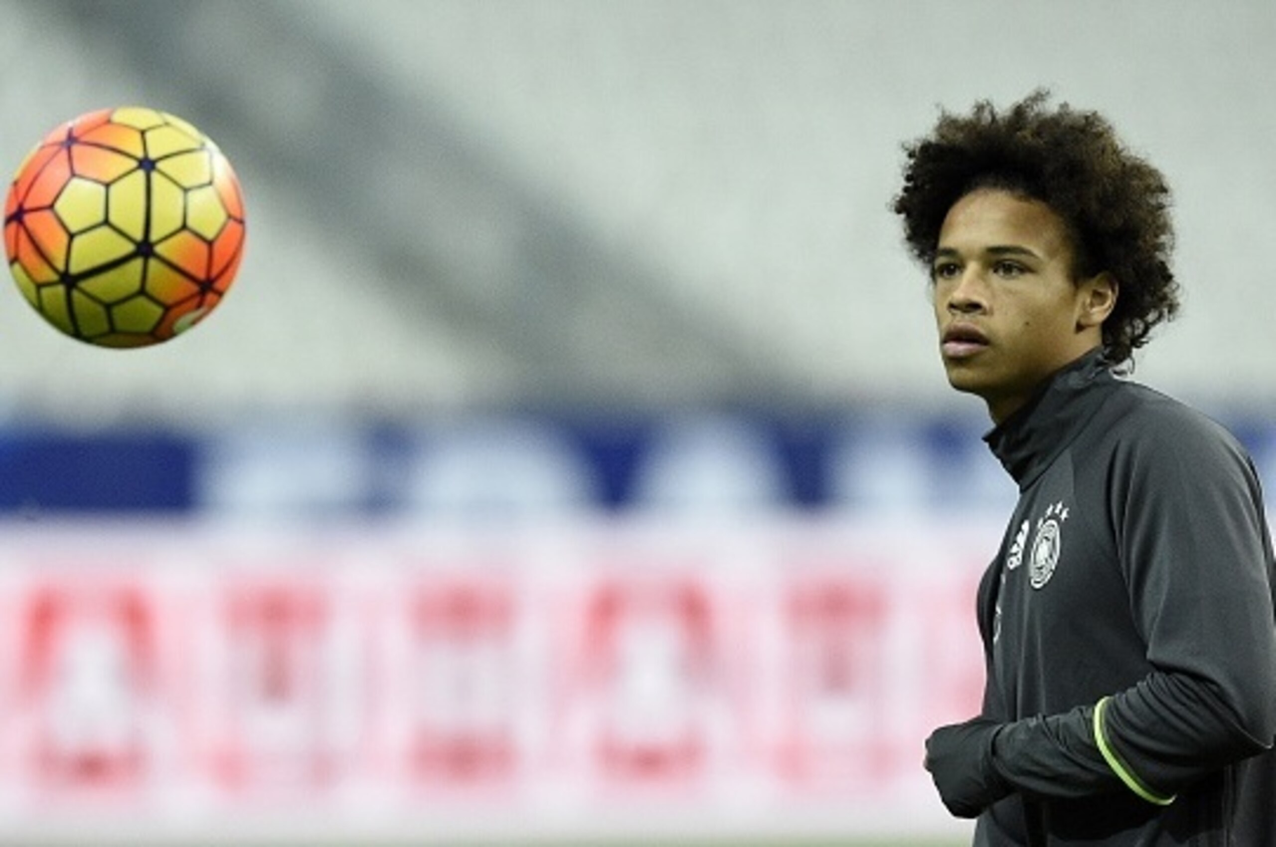 Germany's forward Leroy Sane eyes the ball during a training session at the Stade de France stadium in Saint-Denis, north of Paris, on November 12, 2015, on the eve of a friendly football match between France and Germany.  AFP PHOTO / FRANCK FIFE        (