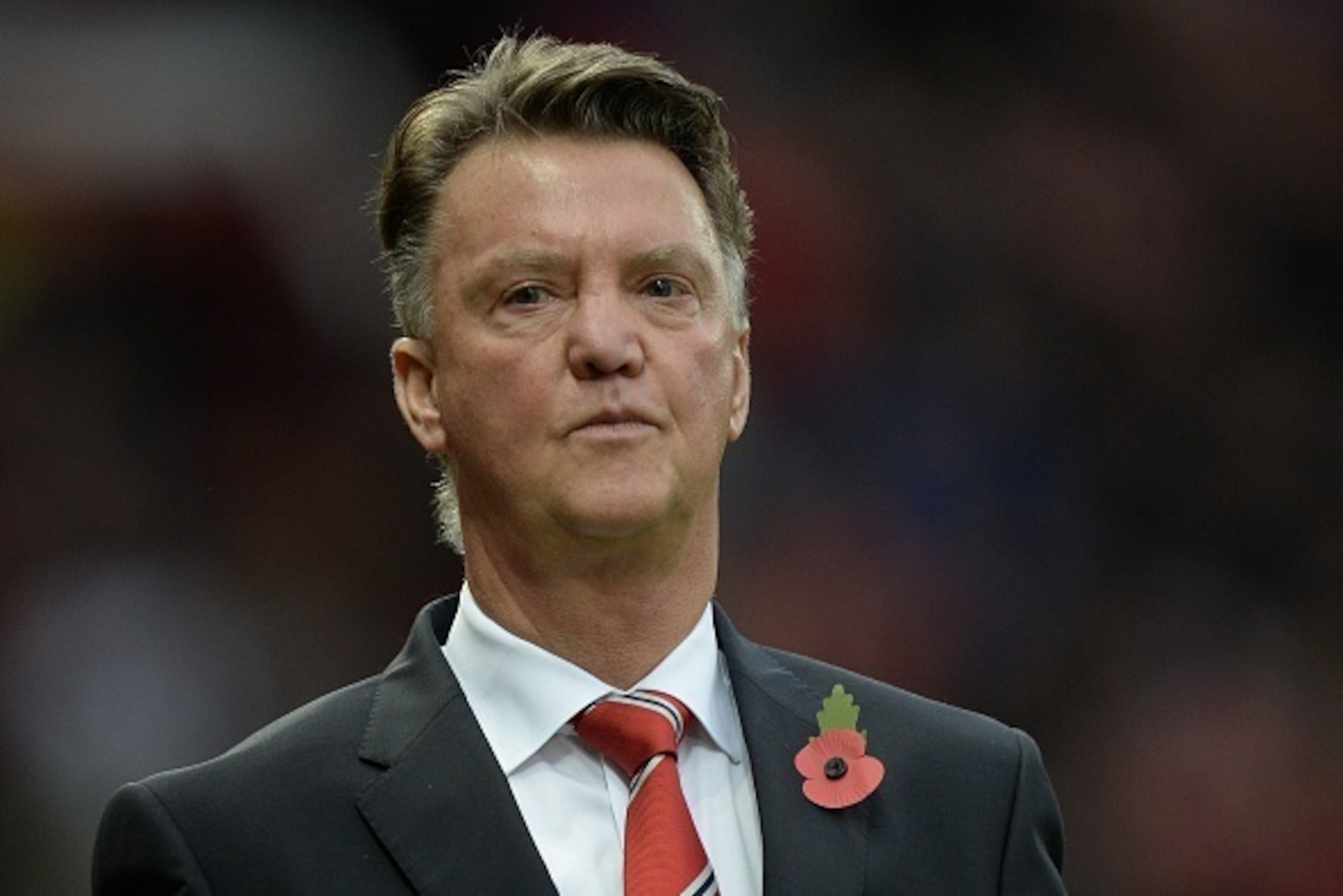 Manchester United's Dutch manager Louis van Gaal leaves the pitch at half-time during the English Premier League football match between Manchester United and West Bromwich Albion at Old Trafford stadium in Manchester, north west England, on November 7, 20