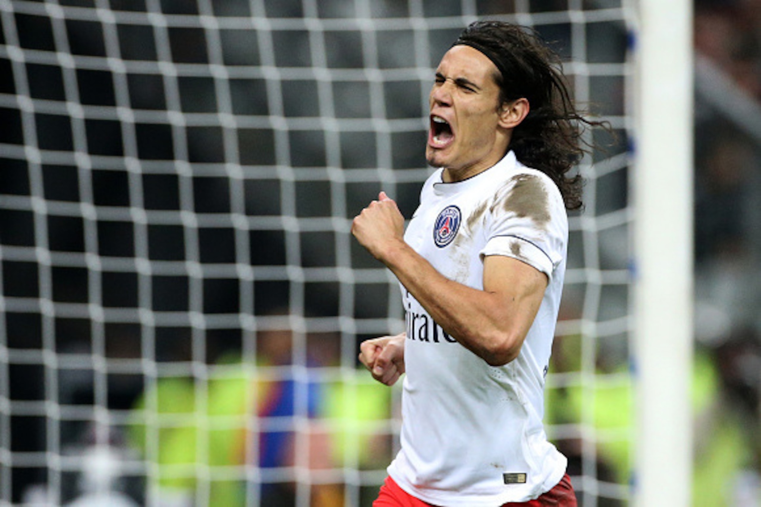 PARIS, FRANCE - OCTOBER 17: Edinson Cavani of PSG celebrates his goal during the French Ligue 1 match between RC Lens and Paris Saint-Germain FC at Stade de France on October 17, 2014 in Saint-Denis near Paris, France. (Photo by Jean Catuffe/Getty Images)