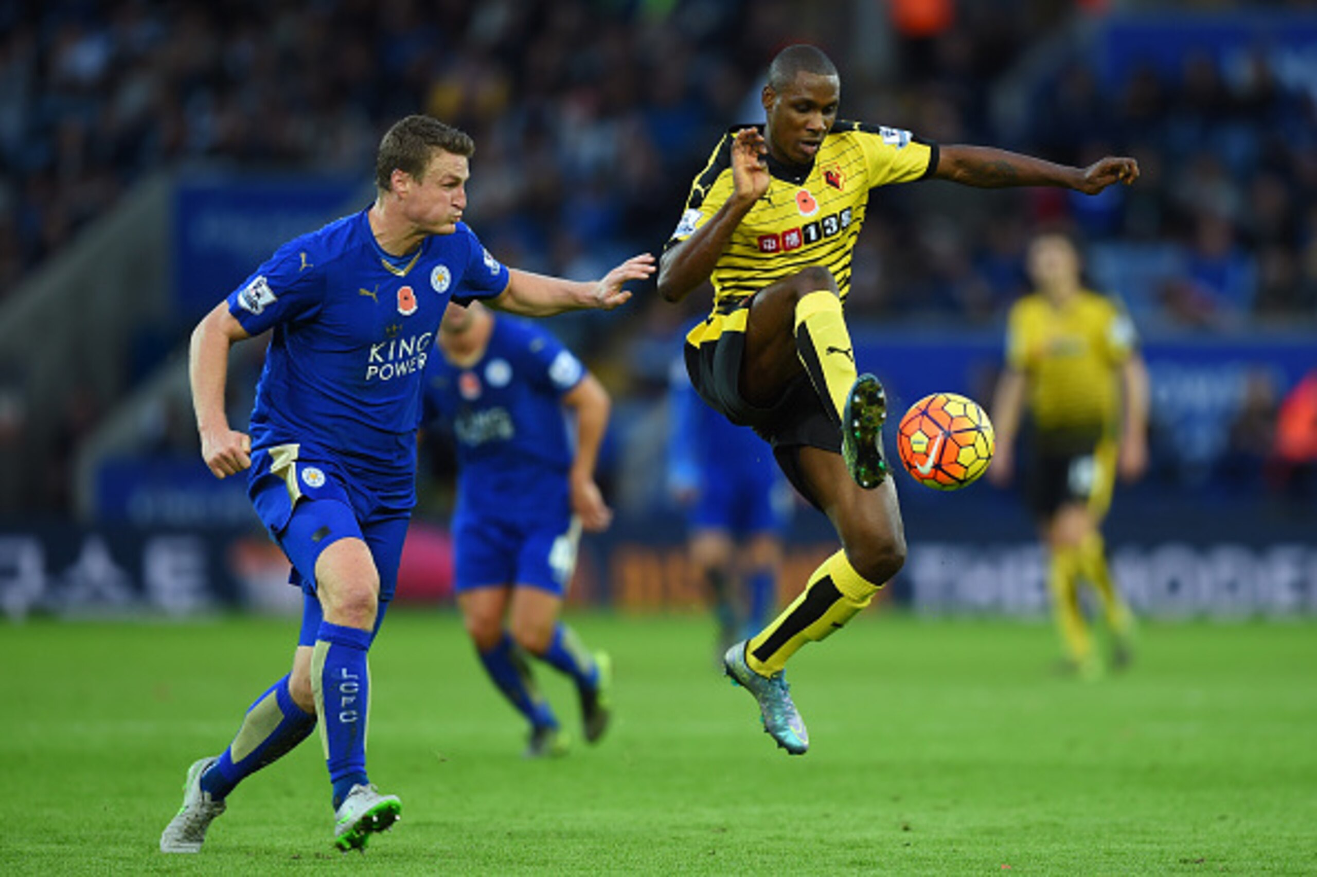 LEICESTER, ENGLAND - NOVEMBER 07:  Odion Ighalo of Watford and Robert Huth of Leicester City compete for the ball during the Barclays Premier League match between Leicester City and Watford at The King Power Stadium on November 7, 2015 in Leicester, Engla