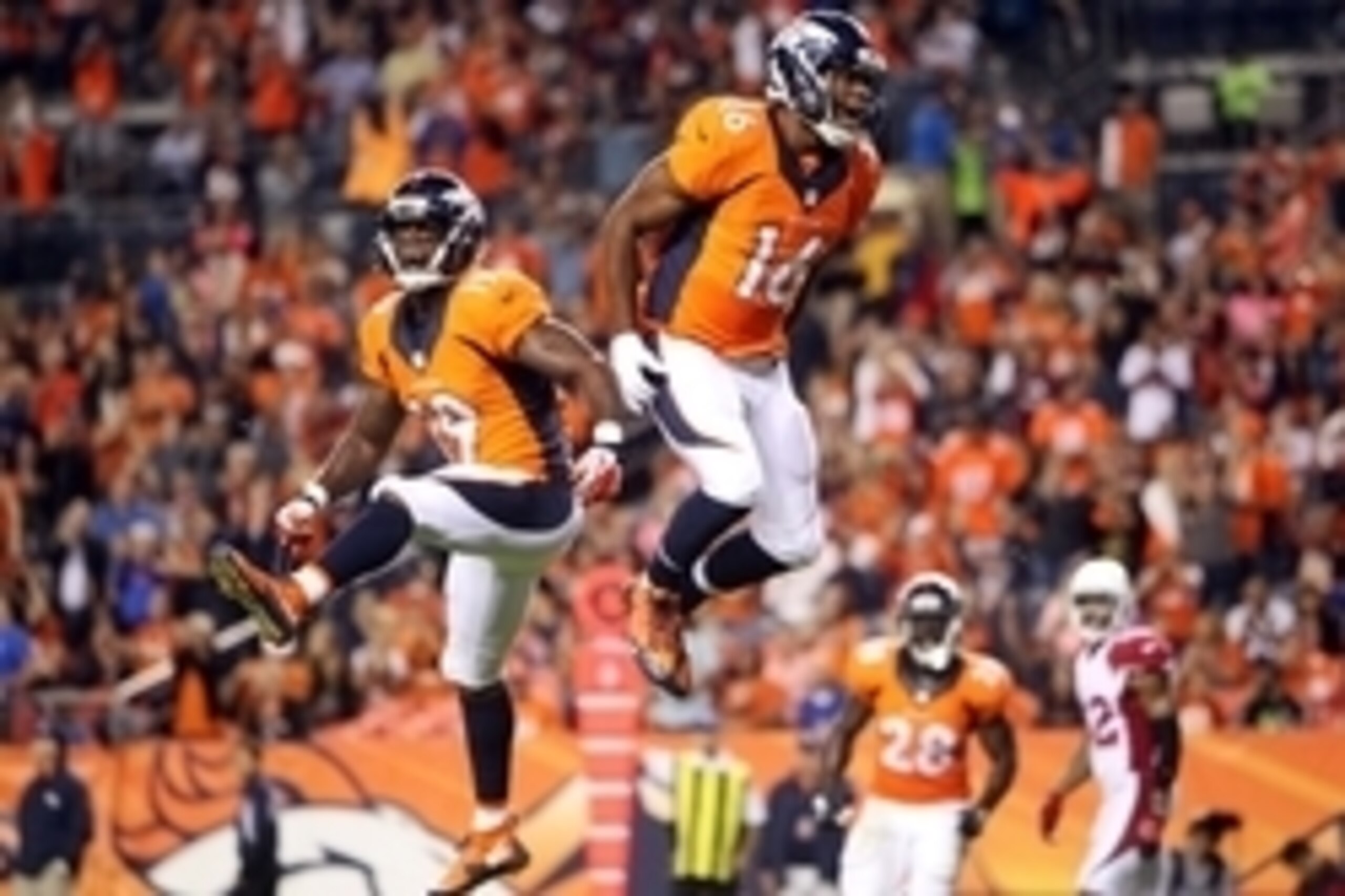 Sep 3, 2015; Denver, CO, USA; Denver Broncos wide receiver Bennie Fowler (16) celebrates with wide receiver Isaiah Burse (19) after catching a touchdown pass during the second half against the Arizona Cardinals at Sports Authority Field at Mile High. The 