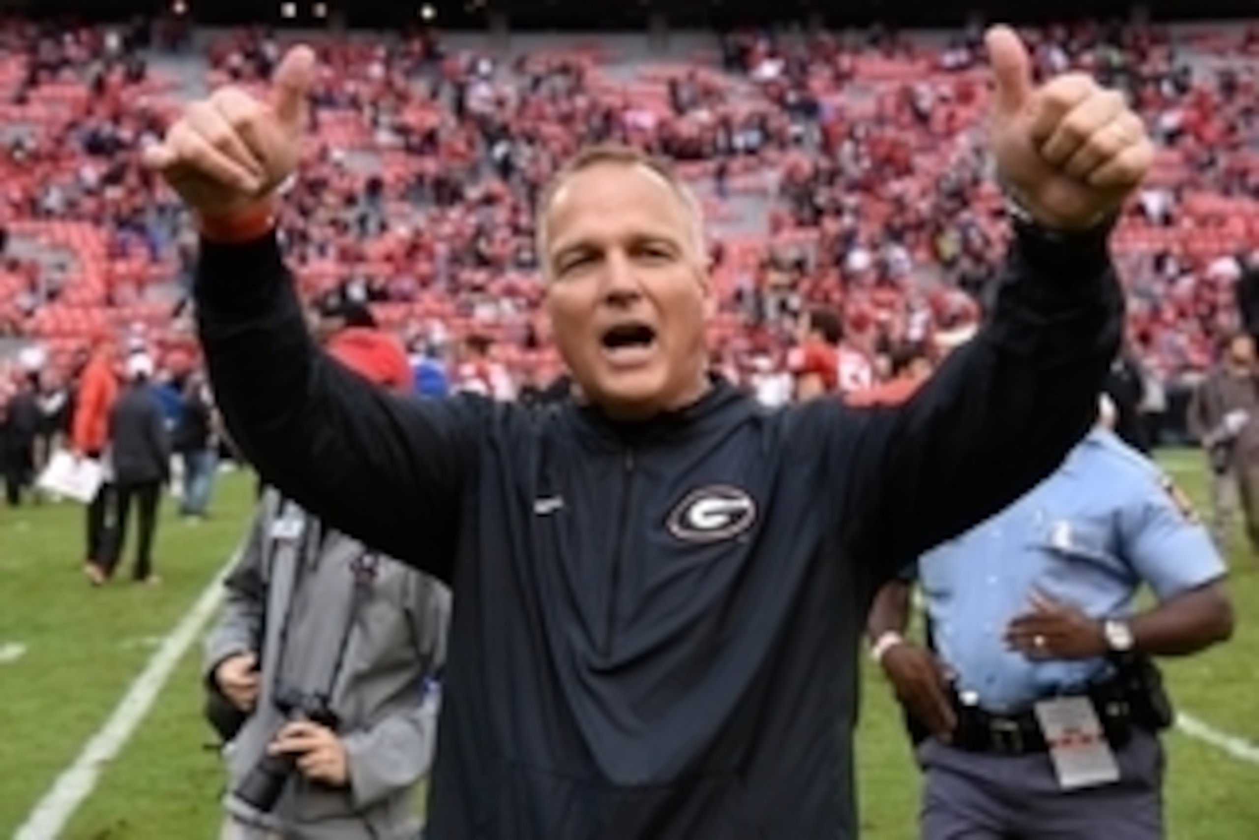 Nov 7, 2015; Athens, GA, USA; Georgia Bulldogs head coach Mark Richt reacts to the fans and students after defeating the Kentucky Wildcats at Sanford Stadium. Georgia defeated Kentucky 27-3. Mandatory Credit: Dale Zanine-USA TODAY Sports
