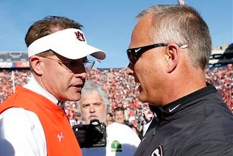 Auburn head coach Gus Malzahn (left) and Georgia head coach Mark Richt (right)