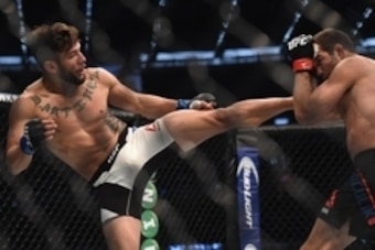 Nov 15, 2015; Melbourne, Australia; Richie Vaculik (red gloves) competes against Danny Martinez (blue gloves) during UFC 193 at Etihad Stadium. Mandatory Credit: Matt Roberts-USA TODAY Sports