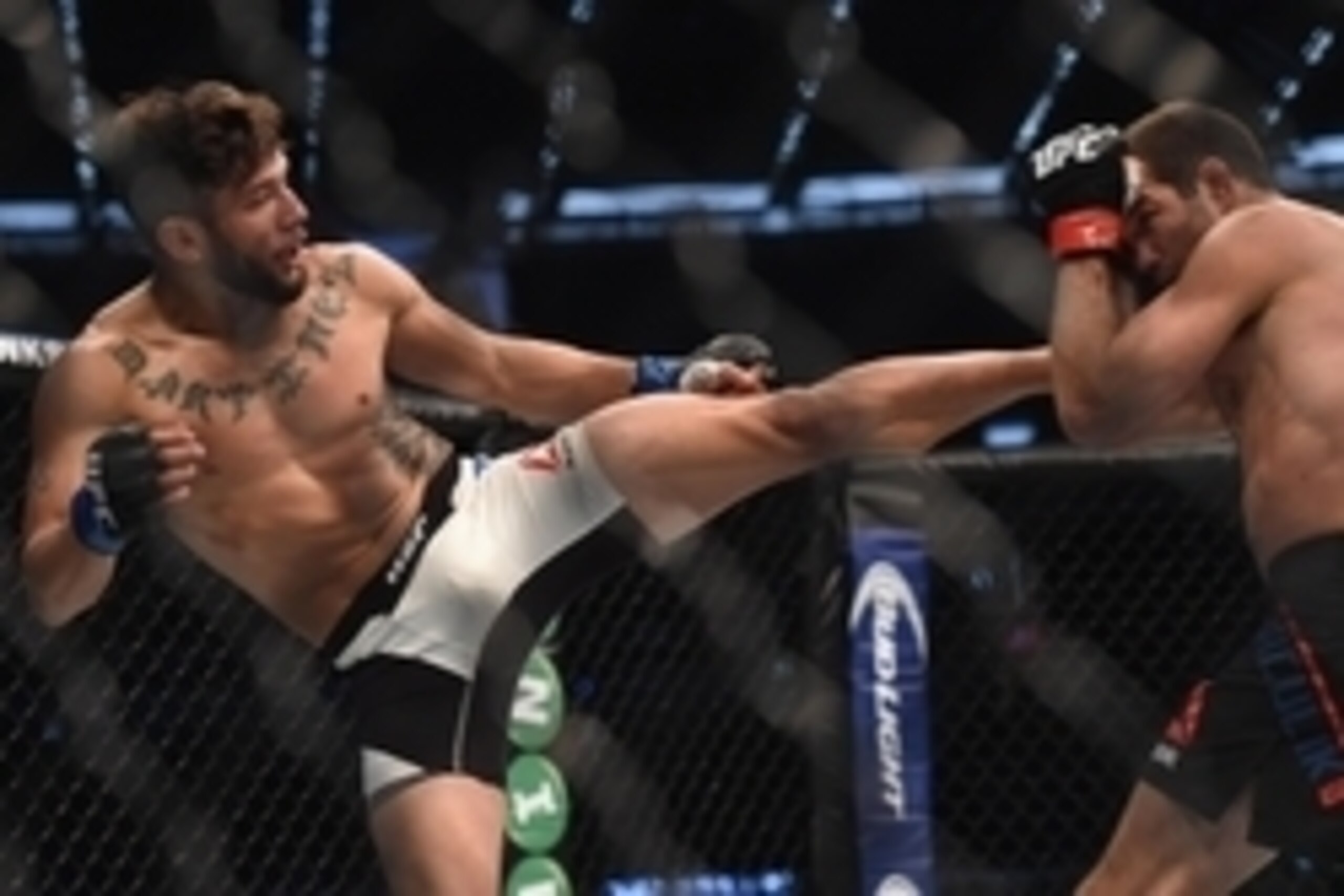 Nov 15, 2015; Melbourne, Australia; Richie Vaculik (red gloves) competes against Danny Martinez (blue gloves) during UFC 193 at Etihad Stadium. Mandatory Credit: Matt Roberts-USA TODAY Sports