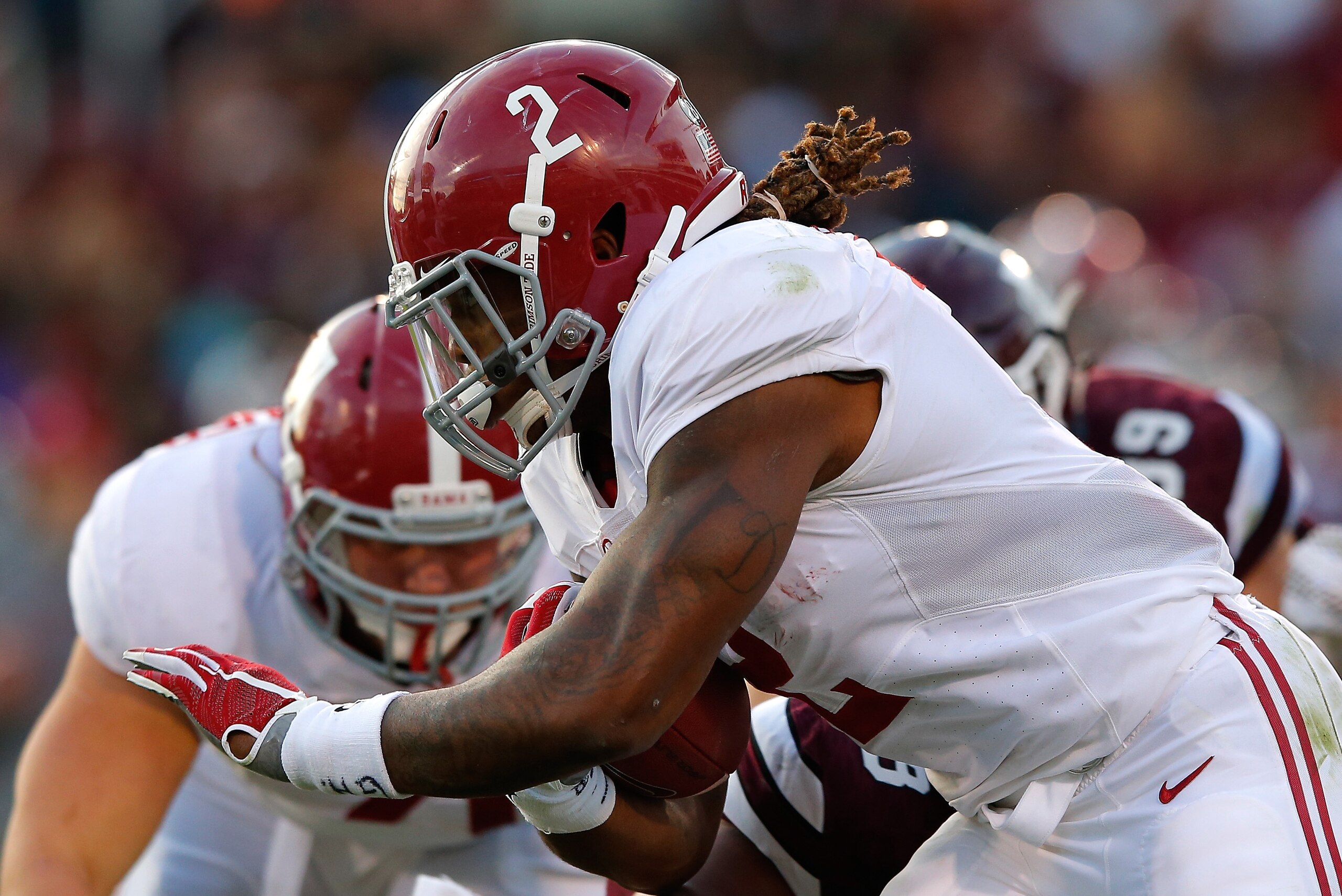 STARKVILLE, MS - NOVEMBER 14:  Derrick Henry #2 of the Alabama Crimson Tide rushes against the Mississippi State Bulldogs at Davis Wade Stadium on November 14, 2015 in Starkville, Mississippi.  (Photo by Kevin C. Cox/Getty Images)