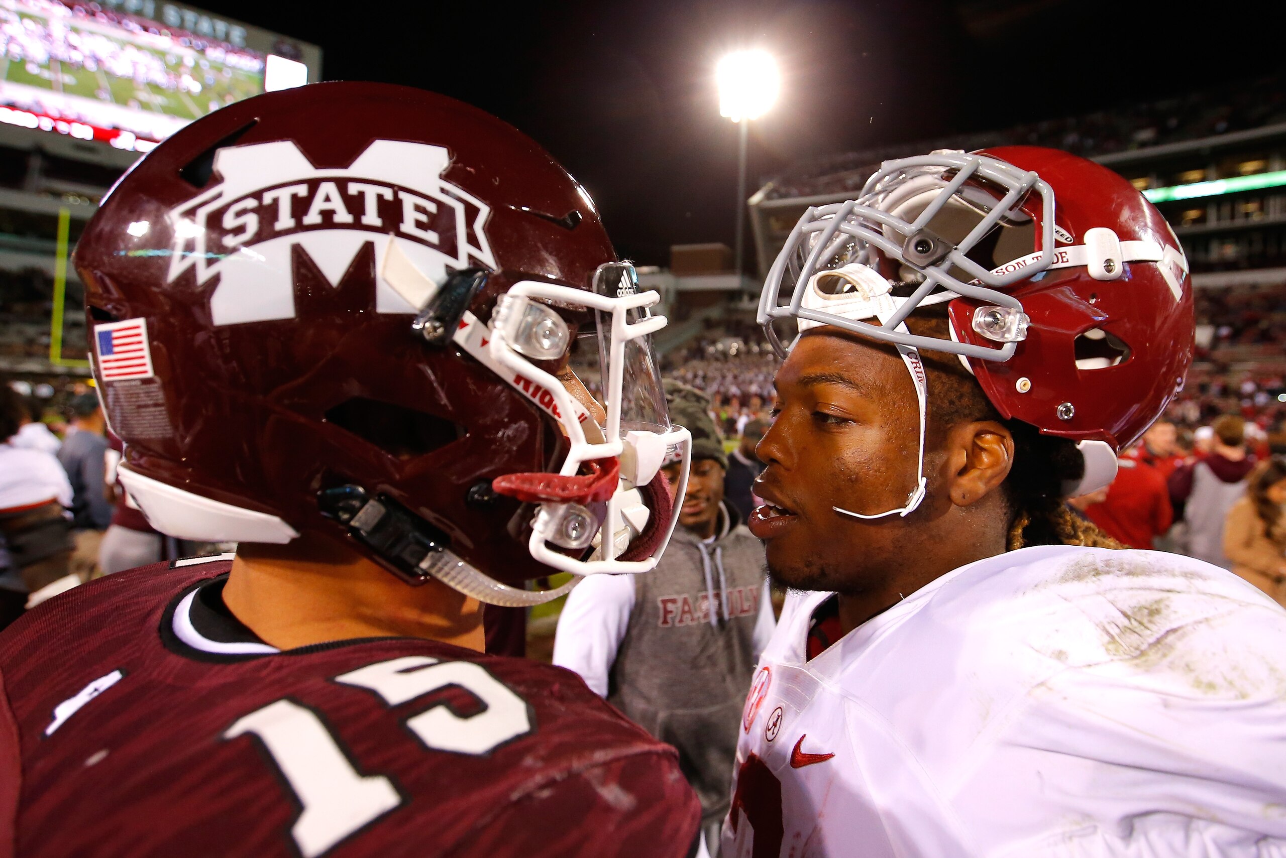 STARKVILLE, MS - NOVEMBER 14:  Dak Prescott #15 of the Mississippi State Bulldogs congratulates Derrick Henry #2 of the Alabama Crimson Tide on their 31-6 win at Davis Wade Stadium on November 14, 2015 in Starkville, Mississippi.  (Photo by Kevin C. Cox/G