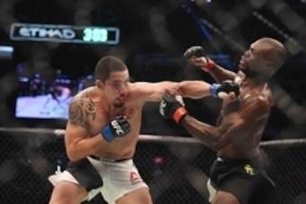 Nov 15, 2015; Melbourne, Australia; Uriah Hall (red gloves) competes against Robert Whittaker (blue gloves) during UFC 193 at Etihad Stadium. Mandatory Credit: Matt Roberts-USA TODAY Sports