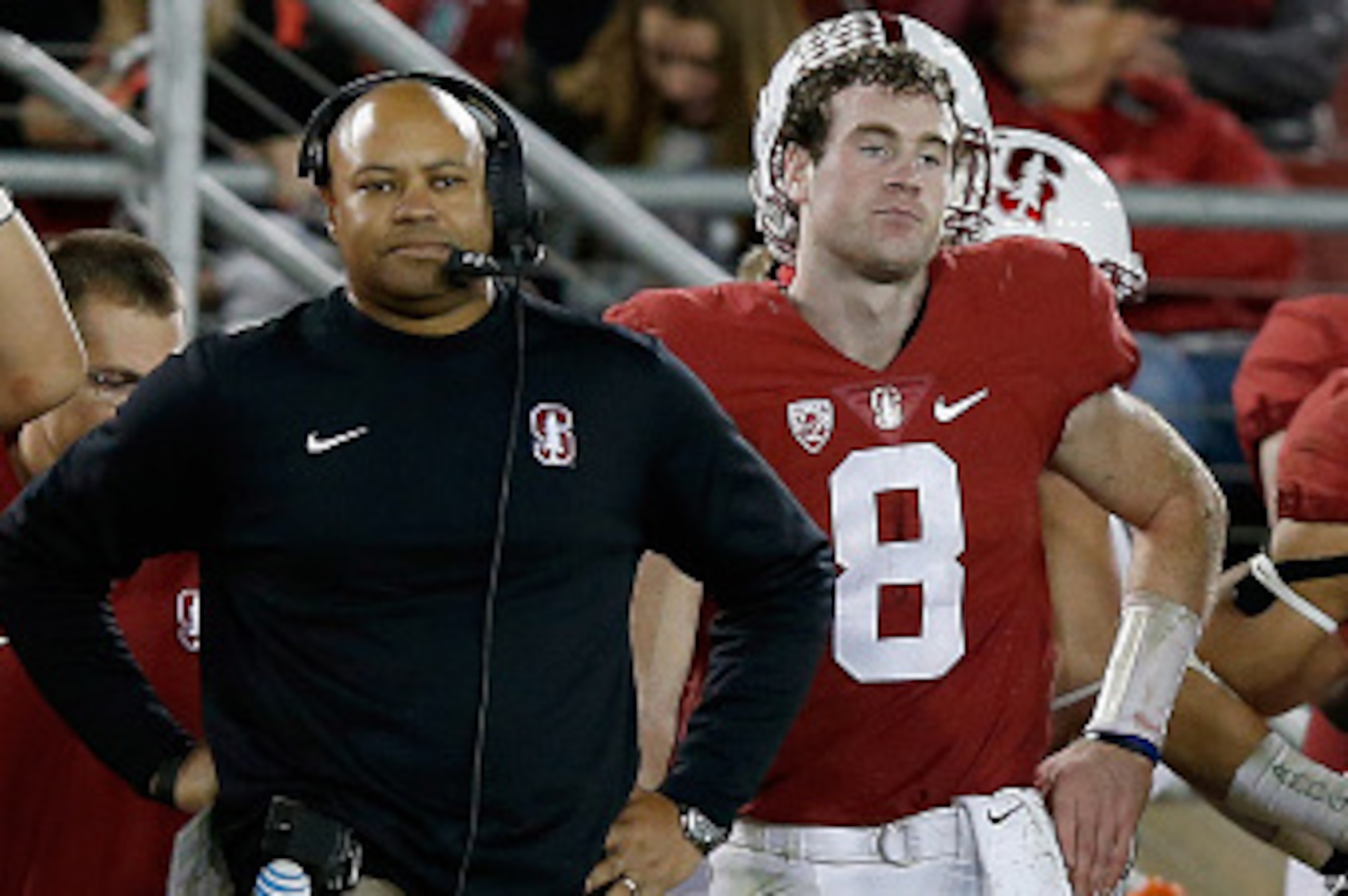 PALO ALTO, CA - NOVEMBER 14:  Kevin Hogan #8 and head coach David Shaw of the Stanford Cardinal stand on the sideline after the Cardinal fumbles the ball in the fourth quarter against the Oregon Ducks at Stanford Stadium on November 14, 2015 in Palo Alto,