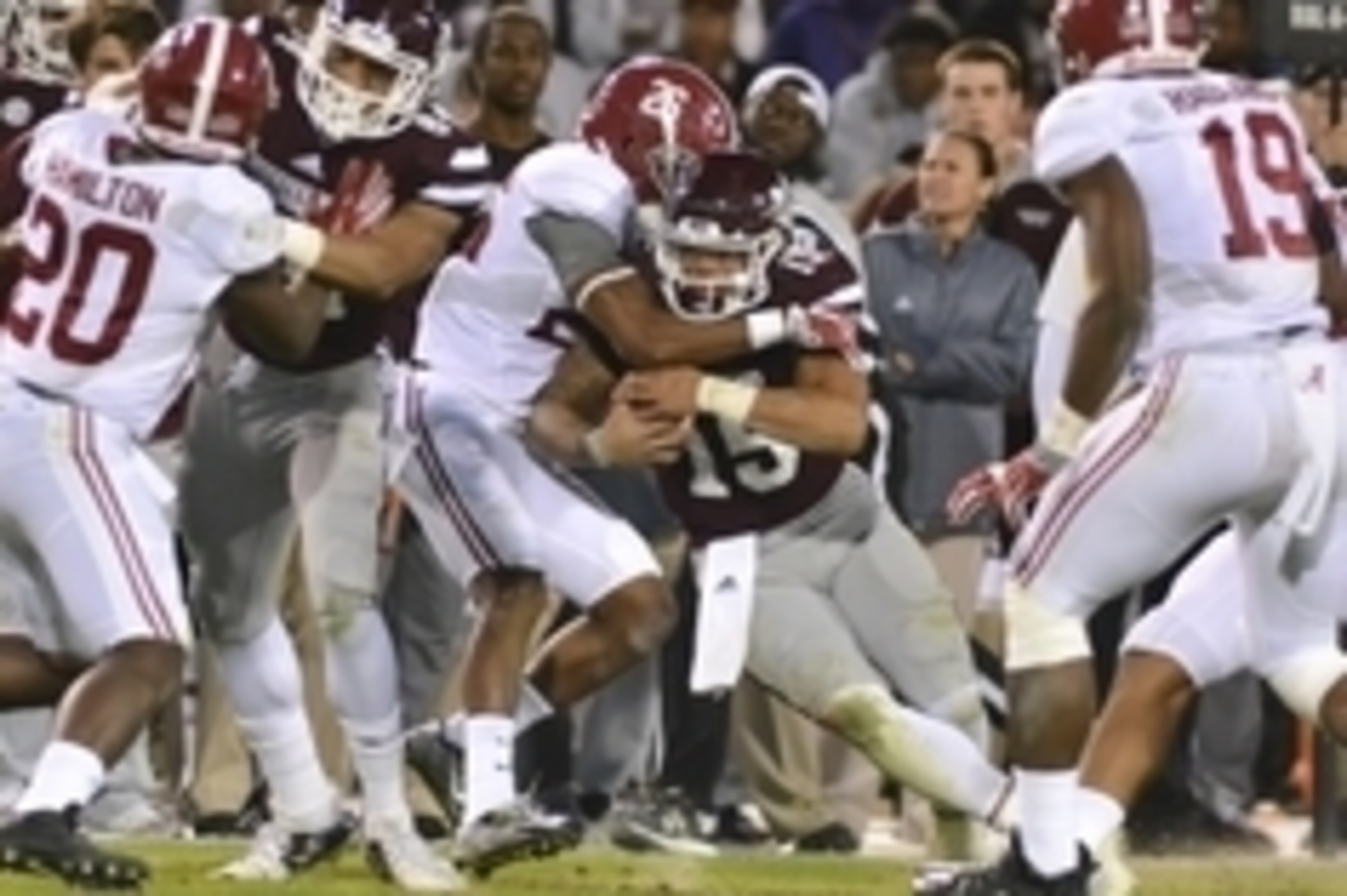 Nov 14, 2015; Starkville, MS, USA; Mississippi State Bulldogs quarterback Dak Prescott (15) is tackled by Alabama Crimson Tide defensive back Marlon Humphrey (26) during the third quarter of the game at Davis Wade Stadium. Alabama won 31-6 Mandatory Credi Nov 14, 2015; Starkville, MS, USA; Mississippi State Bulldogs quarterback Dak Prescott (15) is tackled by Alabama Crimson Tide defensive back Marlon Humphrey (26) during the third quarter of the game at Davis Wade Stadium. Alabama won 31-6 Mandatory Credi