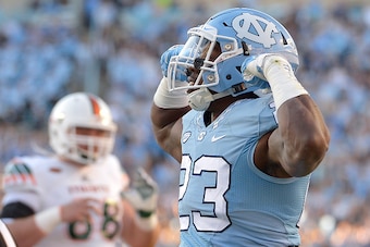 CHAPEL HILL, NC - NOVEMBER 14:  Cayson Collins #23 of the North Carolina Tar Heels reacts after a defensive stop against the Miami Hurricanes during their game at Kenan Stadium on November 14, 2015 in Chapel Hill, North Carolina.  (Photo by Grant Halverso