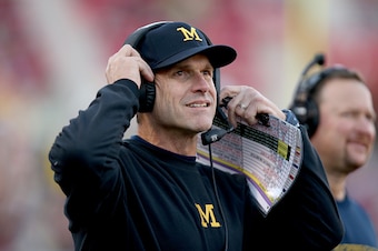 BLOOMINGTON, IN - NOVEMBER 14:  Jim Harbaugh the head coach of the Michigan Wolverines watches the action against the Indiana Hoosiers at Memorial Stadium on November 14, 2015 in Bloomington, Indiana.  (Photo by Andy Lyons/Getty Images)