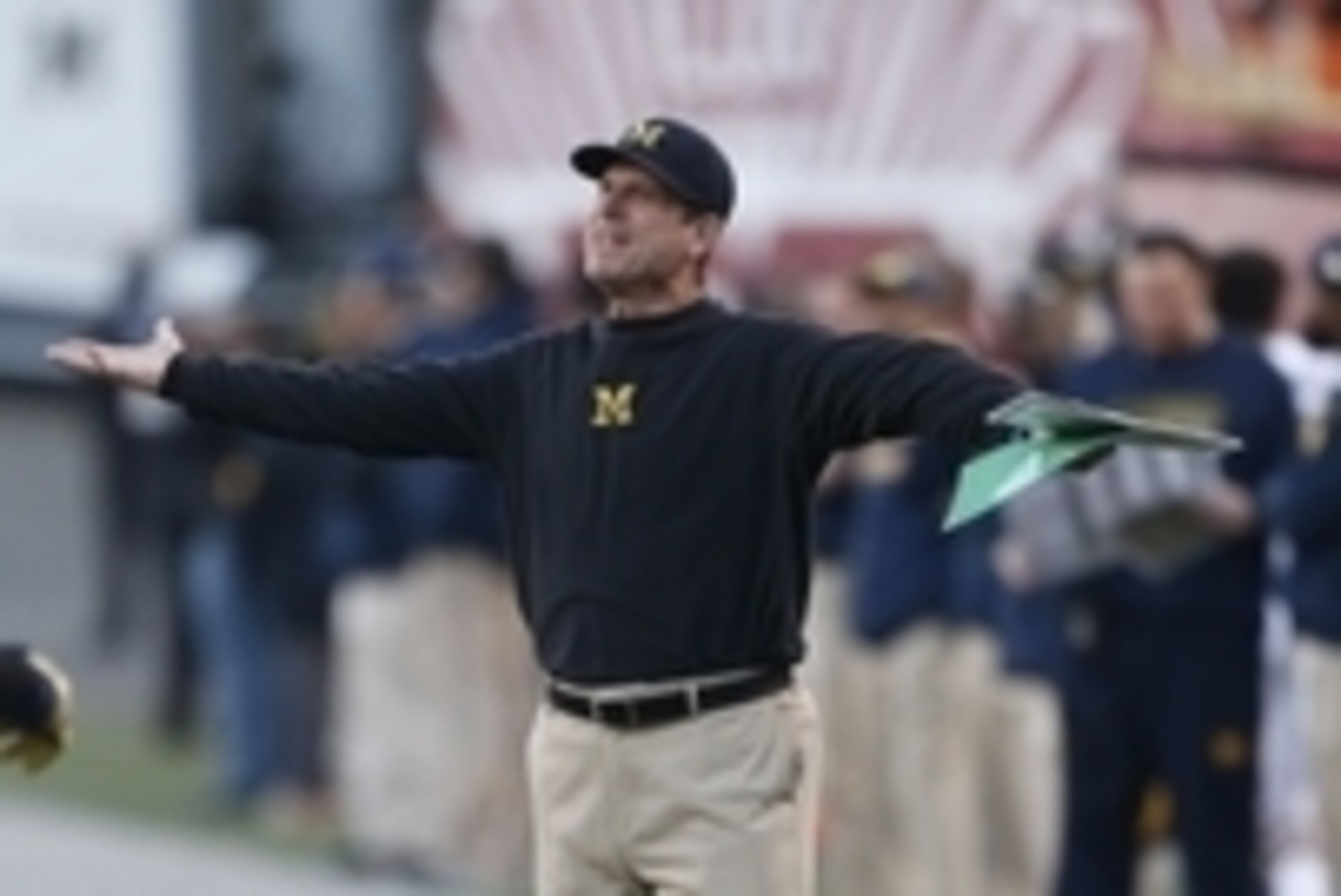 Nov 14, 2015; Bloomington, IN, USA; Michigan Wolverines coach Jim Harbaugh coaches on the sidelines against the Indiana Hoosiers at Memorial Stadium. Mandatory Credit: Brian Spurlock-USA TODAY Sports