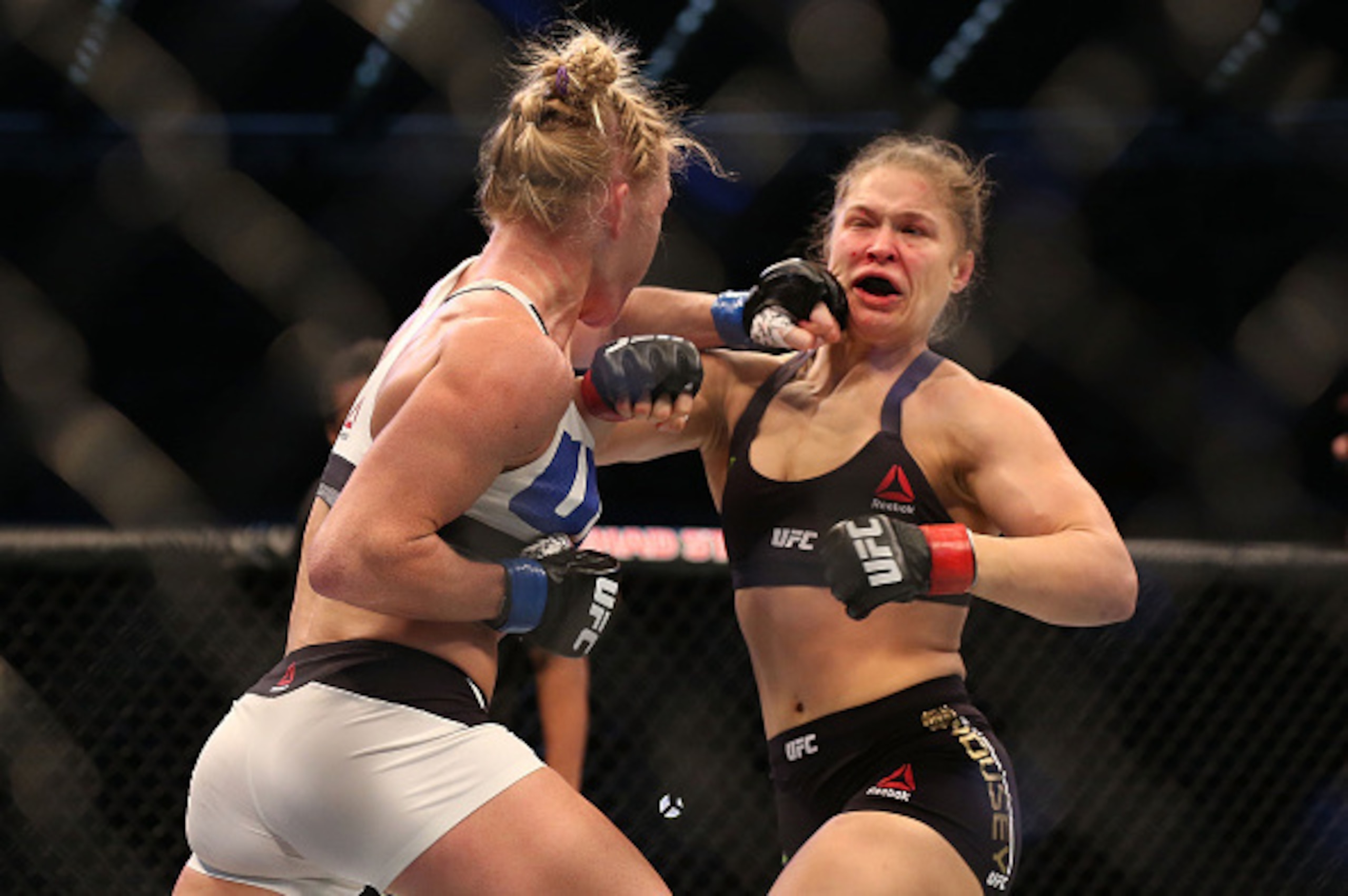 MELBOURNE, AUSTRALIA - NOVEMBER 15:  Ronda Rousey of the United States (R) and Holly Holm of the United States compete in their UFC women's bantamweight championship bout during the UFC 193 event at Etihad Stadium on November 15, 2015 in Melbourne, Austra