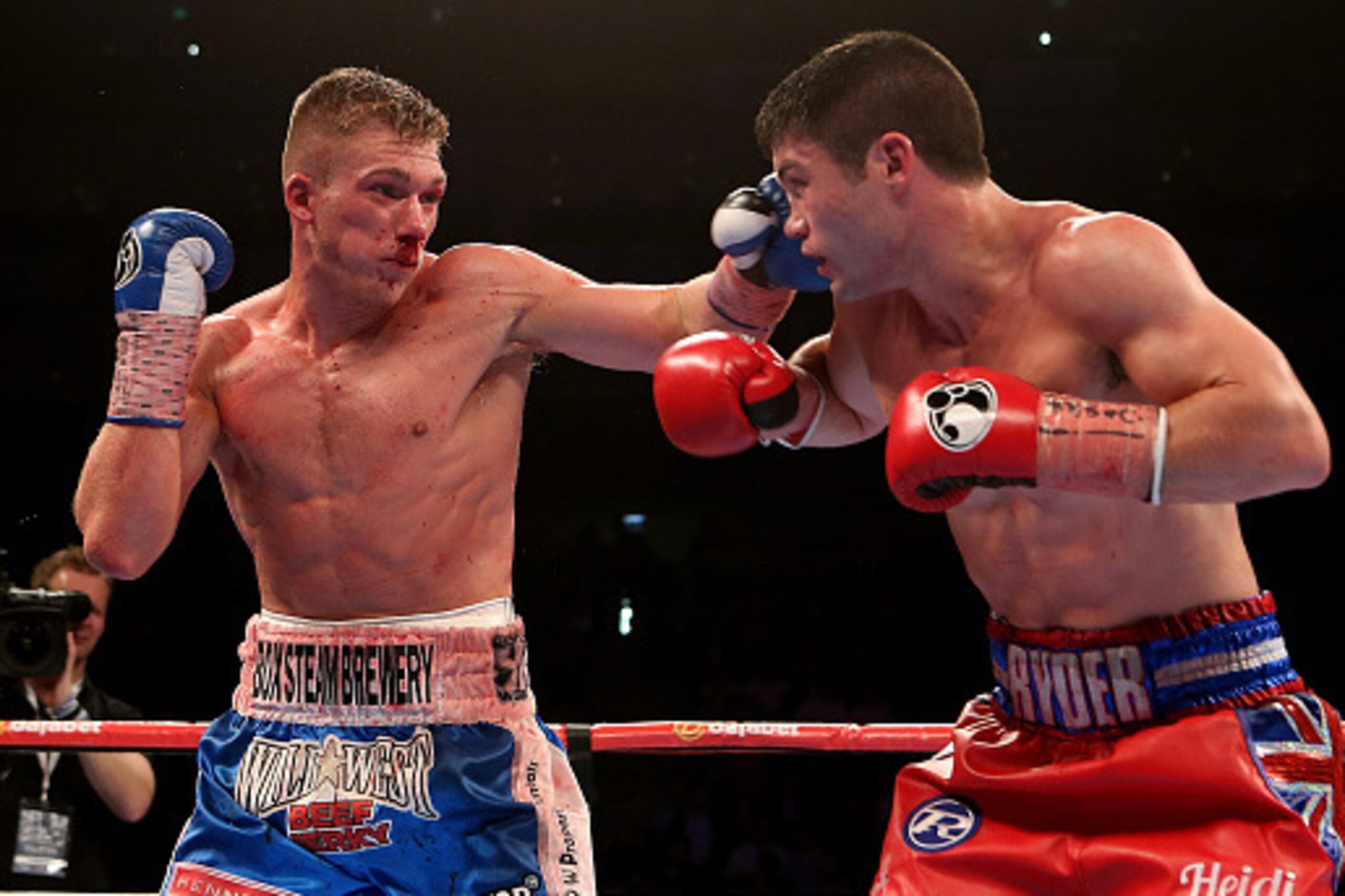 LONDON, ENGLAND - MAY 30:  Nick Blackwell of England lands a punch on John Ryder of England during their British Middleweight Championship fight at The O2 Arena on May 30, 2015 in London, England.  (Photo by Ben Hoskins/Getty Images)