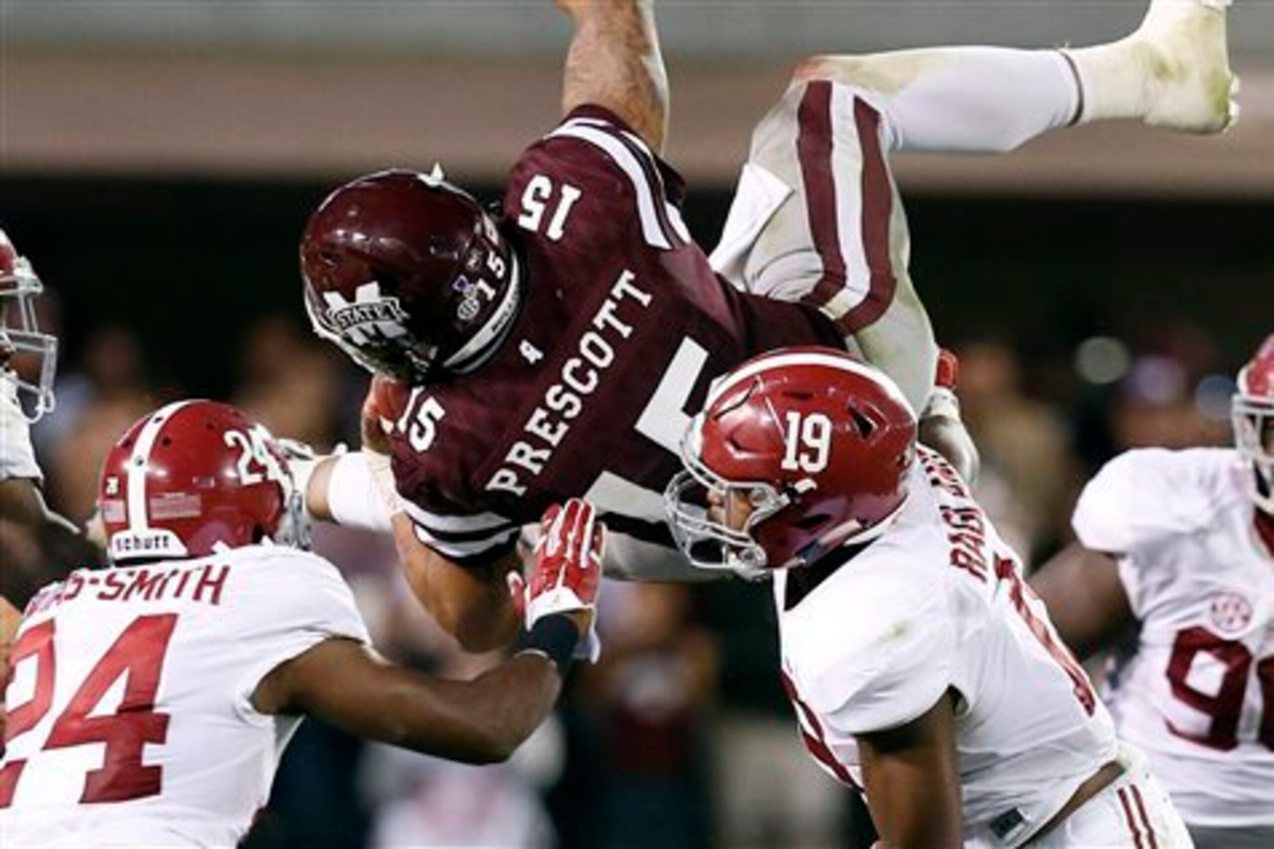 Alabama DB Geno Matias-Smith (24) and LB Reggie Ragland (19)