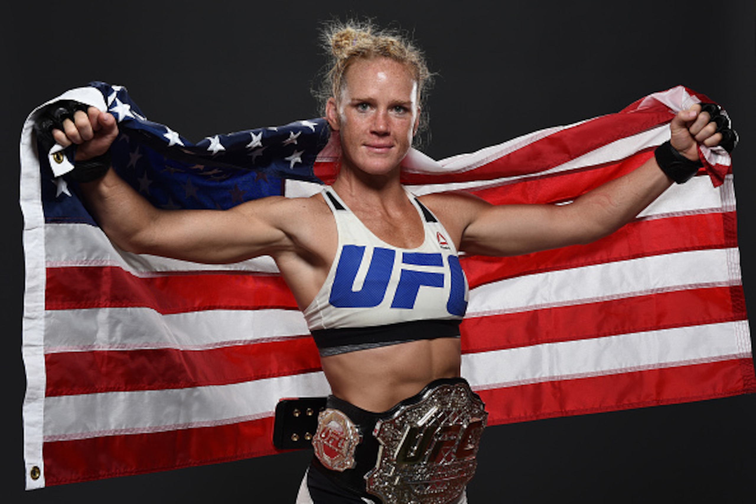 MELBOURNE, AUSTRALIA - NOVEMBER 15:  UFC women's bantamweight champion Holly Holm poses backstage for a post-fight portrait after the UFC 193 event at Etihad Stadium on November 15, 2015 in Melbourne, Australia. Holly Holm defeated Ronda Rousey by KO in s