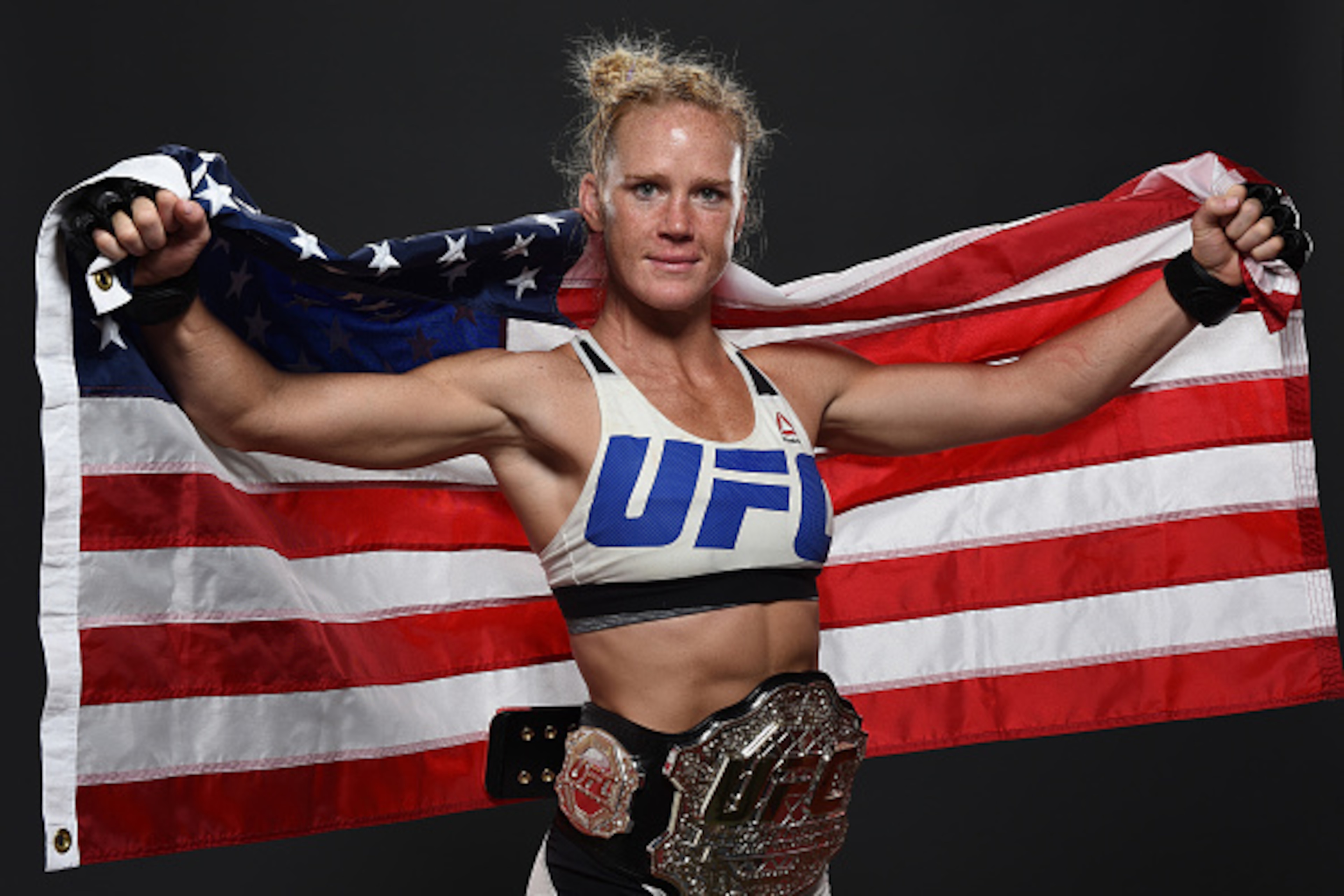 MELBOURNE, AUSTRALIA - NOVEMBER 15:  UFC women's bantamweight champion Holly Holm poses backstage for a post-fight portrait after the UFC 193 event at Etihad Stadium on November 15, 2015 in Melbourne, Australia. Holly Holm defeated Ronda Rousey by KO in s