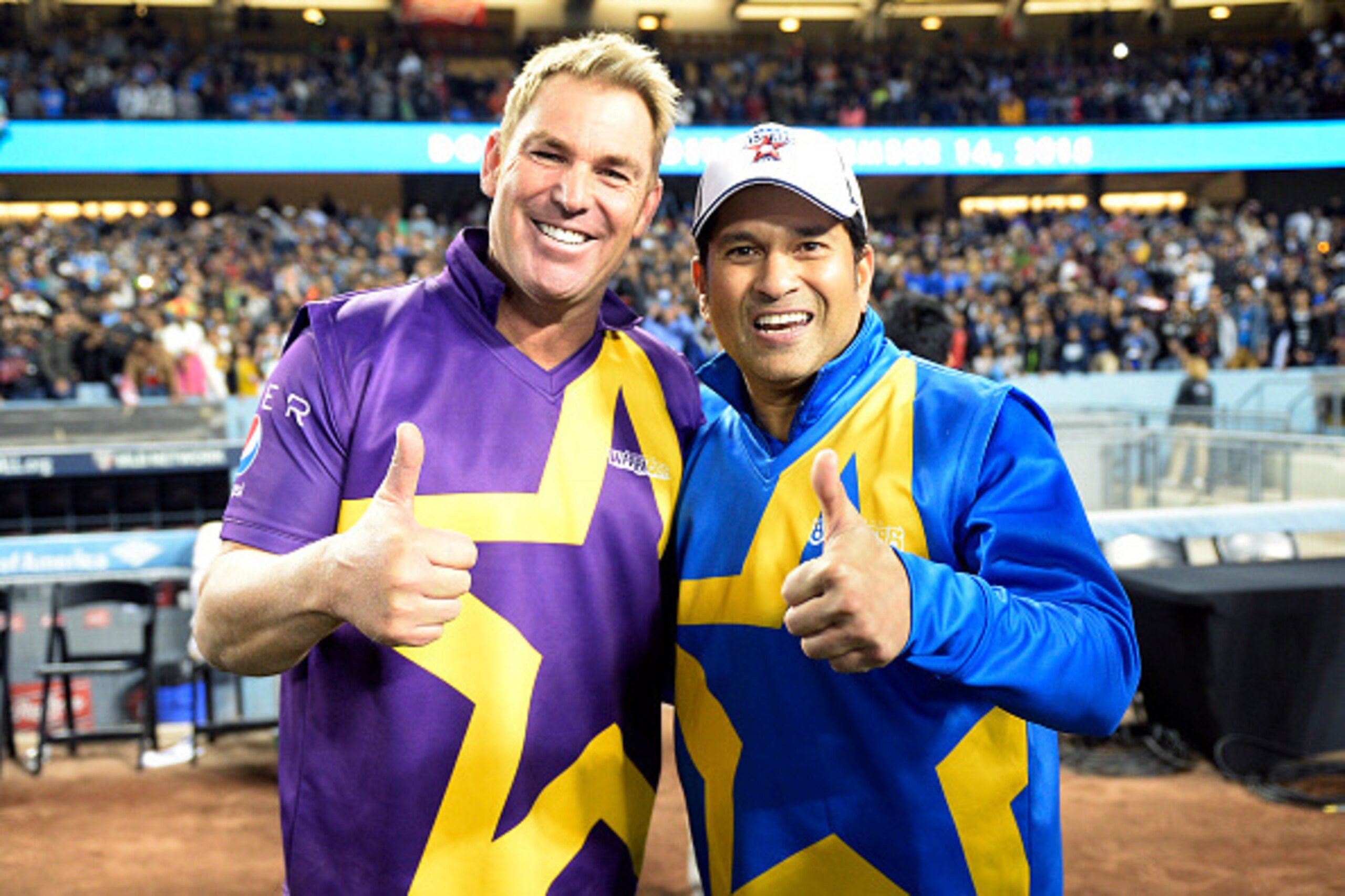 LOS ANGELES CA - NOVEMBER 14: Shane's Warriors  Shane Warne (L) and Sachin's Blasters Sachin Tendulkar pose after the final game of a three-match three city US tour of Twenty20 series of Cricket All-Stars Series at Dodger Stadium November 14, 2015 in Los 