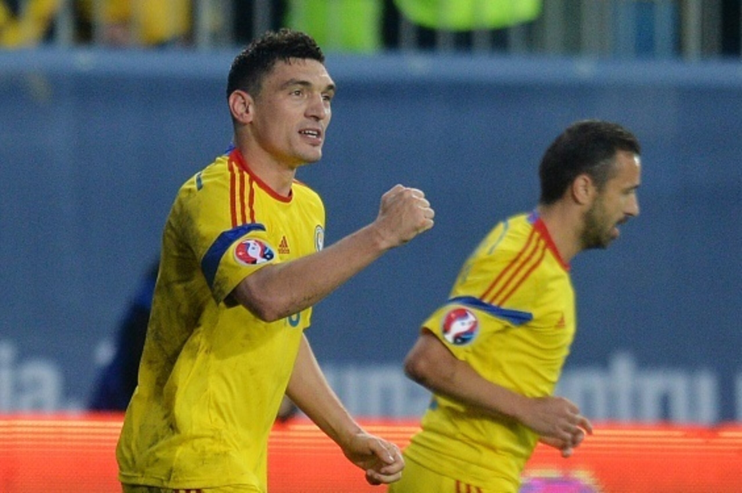 Claudiu Keseru (L) of Romania celebrates after he scored 1-0 against Faroe Islands during the UEFA Euro 2016 qualifying football match during the Group F Euro 2016 qualifying football match between Romania and Faroe Islands, on March 29, 2015 in Ploiesti,