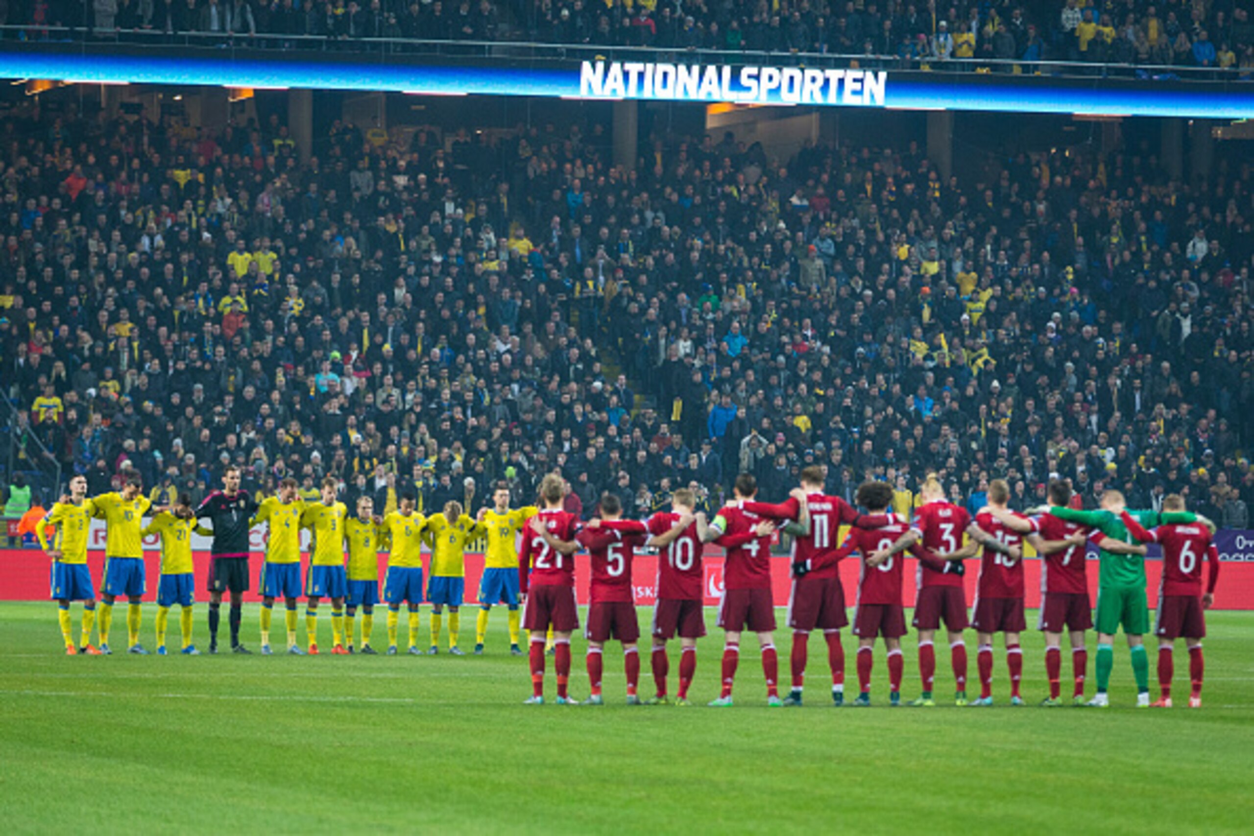 SOLNA, SWEDEN - NOVEMBER 14:  A moment of silence for the victims of the Paris attack is observed at the start of the European Qualifier Play-Off between Sweden and Denmark on November 14, 2015 in Solna, Sweden.  (Photo by Michael Campanella/Getty Images)