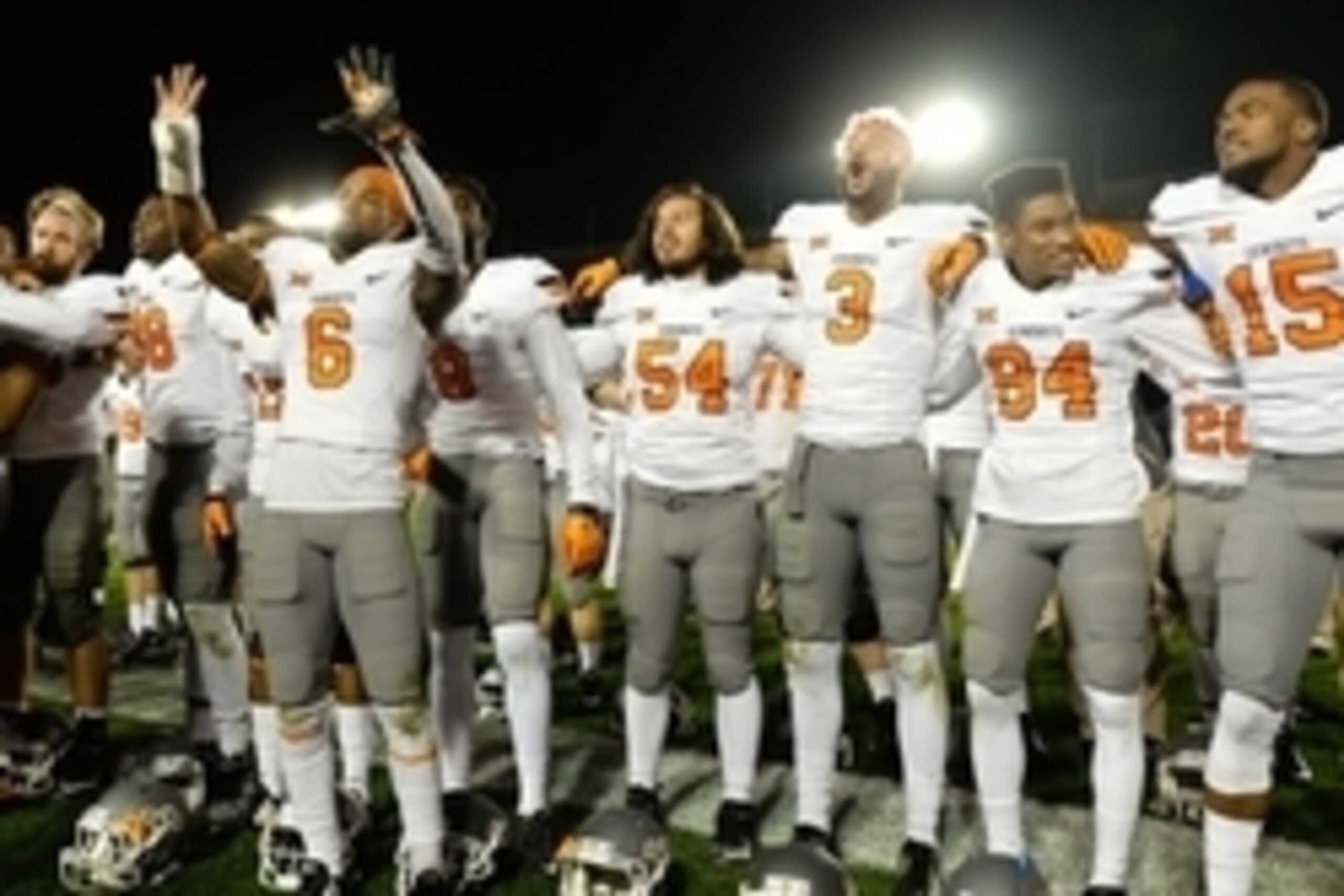 Nov 14, 2015; Ames, IA, USA; The Oklahoma State Cowboys players sing to fans after defeating the Iowa State Cyclones 35-31 at Jack Trice Stadium. Mandatory Credit: Steven Branscombe-USA TODAY Sports