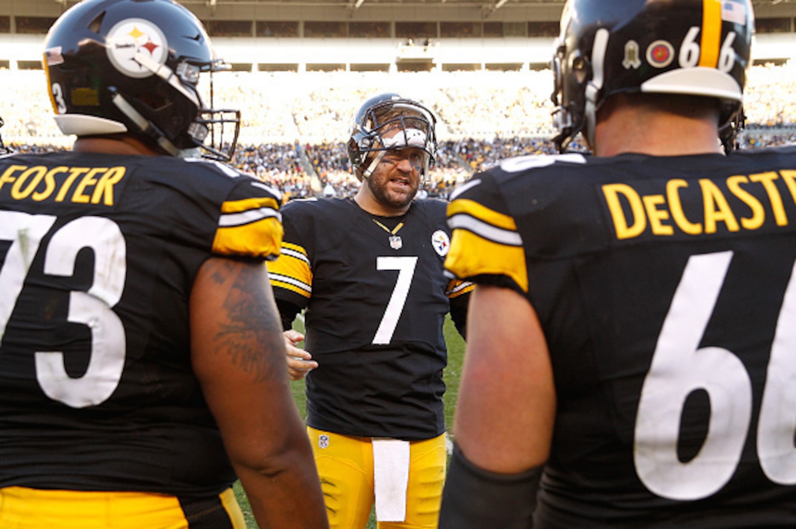 PITTSBURGH, PA - NOVEMBER 15:  Ben Roethlisberger #7 of the Pittsburgh Steelers talks to Ramon Foster #73 and David DeCastro #66 during the 4th quarter of the game against the Cleveland Browns at Heinz Field on November 15, 2015 in Pittsburgh, Pennsylvani