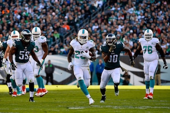 PHILADELPHIA, PA - NOVEMBER 15:  Jay Ajayi #23 of the Miami Dolphins runs the ball against the Philadelphia Eagles in the second quarter at Lincoln Financial Field on November 15, 2015 in Philadelphia, Pennsylvania.  (Photo by Alex Goodlett/Getty Images)