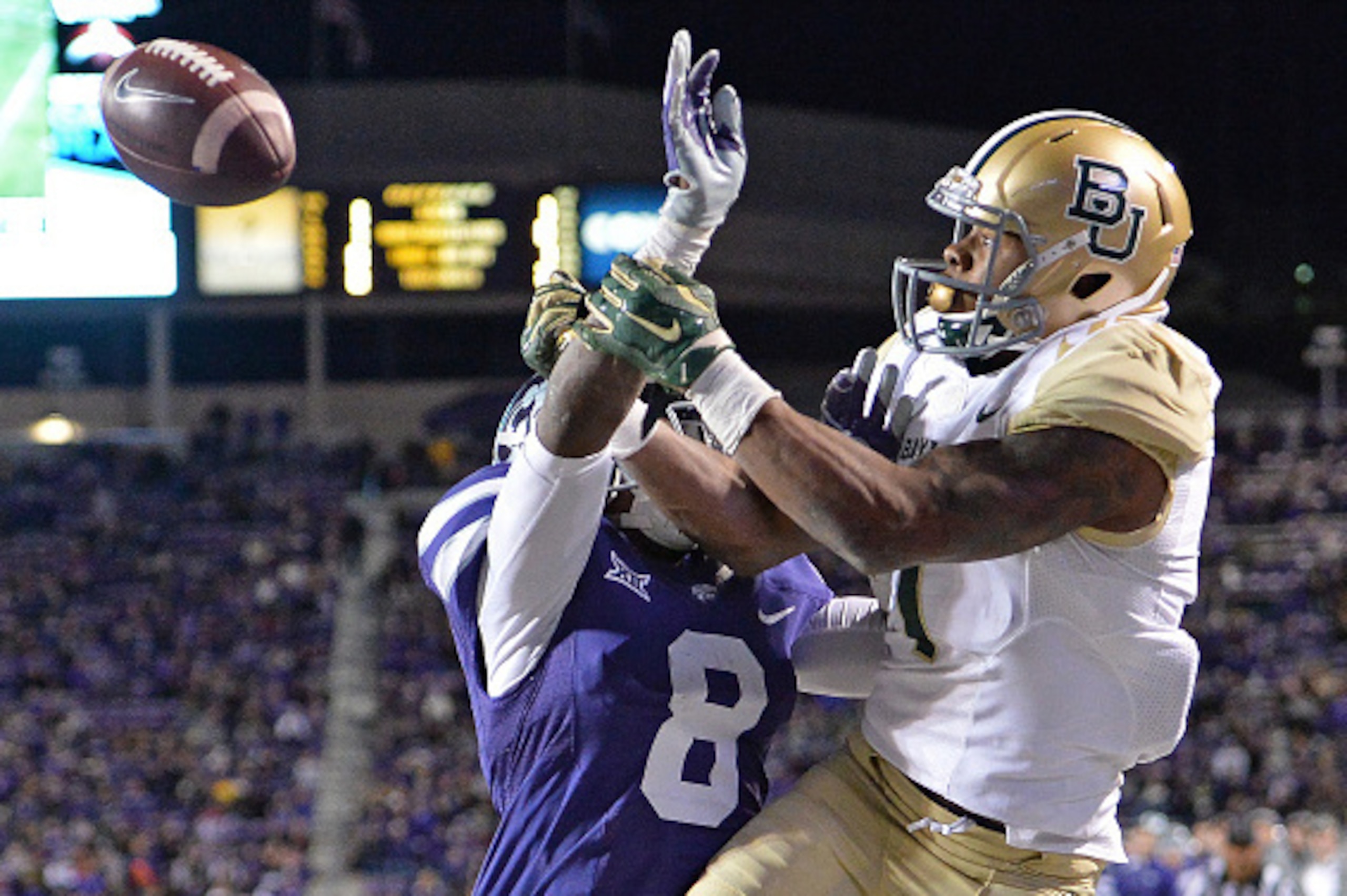 MANHATTAN, KS - NOVEMBER 05: Defensive back Duke Shelley #8 of the Kansas State Wildcats brakes up a pass in the end zone intended for wide receiver Corey Coleman #1 of the Baylor Bears during the second half on November 5, 2015 at Bill Snyder Family Sta MANHATTAN, KS - NOVEMBER 05: Defensive back Duke Shelley #8 of the Kansas State Wildcats brakes up a pass in the end zone intended for wide receiver Corey Coleman #1 of the Baylor Bears during the second half on November 5, 2015 at Bill Snyder Family Sta