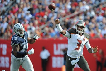 TAMPA, FL - NOVEMBER 15: Quarterback Jameis Winston #3 of the Tampa Bay Buccaneers scrambles away from defensive end Greg Hardy #76 of the Dallas Cowboys in the fourth quarter at Raymond James Stadium on November 15, 2015 in Tampa, Florida. (Photo by Clif
