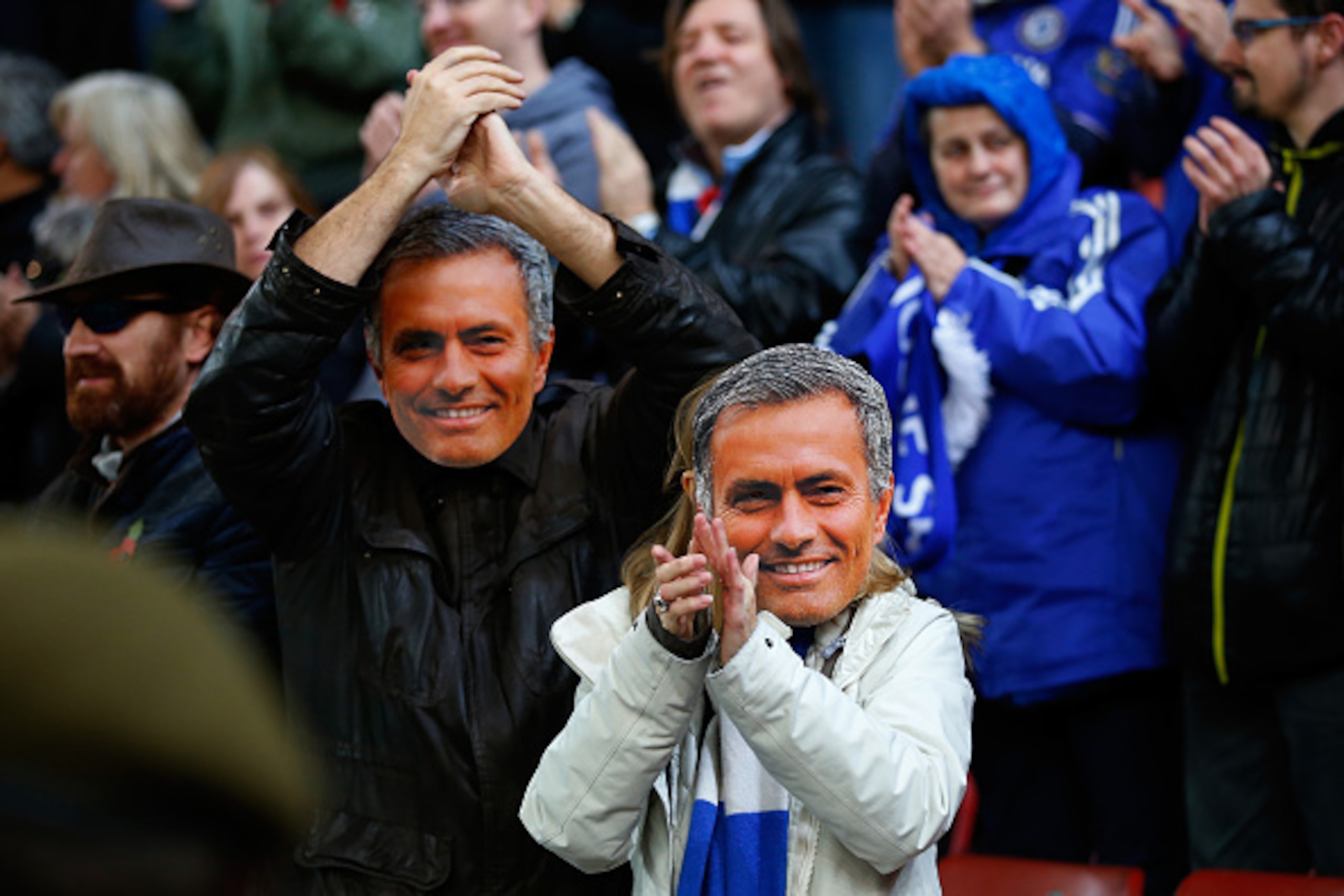STOKE ON TRENT, ENGLAND - NOVEMBER 07: Chelsea fans wearing Jose Mourinho masks cheer prior to the Barclays Premier League match between Stoke City and Chelsea at Britannia Stadium on November 7, 2015 in Stoke on Trent, England. (Photo by Laurence Griff STOKE ON TRENT, ENGLAND - NOVEMBER 07: Chelsea fans wearing Jose Mourinho masks cheer prior to the Barclays Premier League match between Stoke City and Chelsea at Britannia Stadium on November 7, 2015 in Stoke on Trent, England. (Photo by Laurence Griff