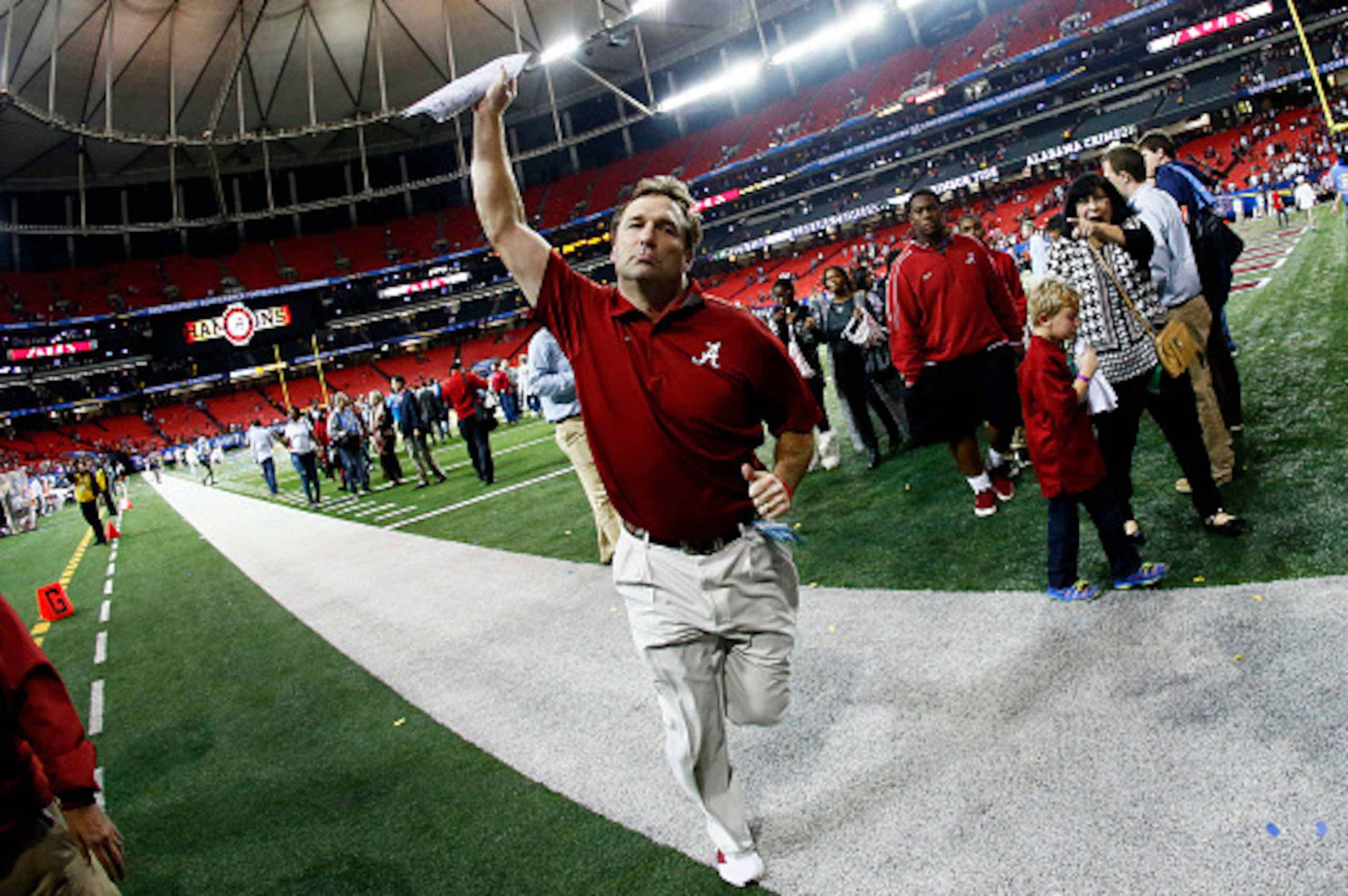 ATLANTA, GA - DECEMBER 06:  Defensive coordinator Kirby Smart of the Alabama Crimson Tide celebrates their 42 to 13 win over the Missouri Tigers in the SEC Championship game at the Georgia Dome on December 6, 2014 in Atlanta, Georgia.  (Photo by Kevin C. 
