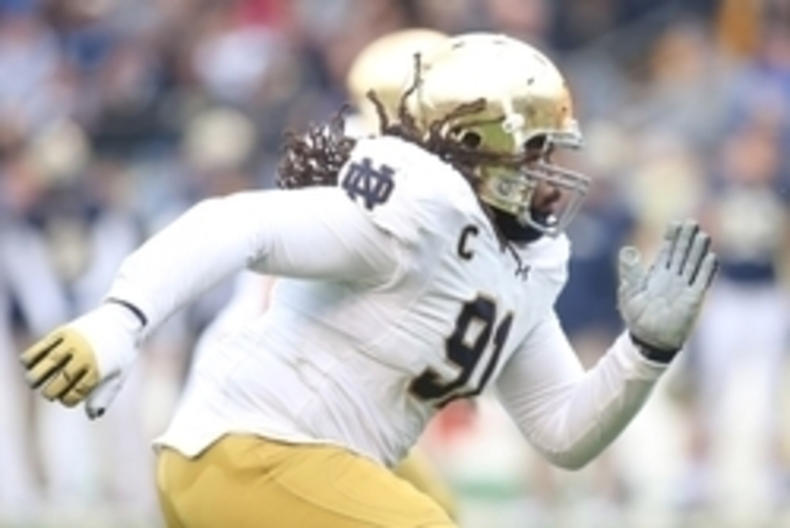 Nov 7, 2015; Pittsburgh, PA, USA; Notre Dame Fighting Irish defensive lineman Sheldon Day (91) breaks off of the line of scrimmage against the Pittsburgh Panthers during the fourth quarter at Heinz Field. Notre Dame won 42-30. Mandatory Credit: Charles Le