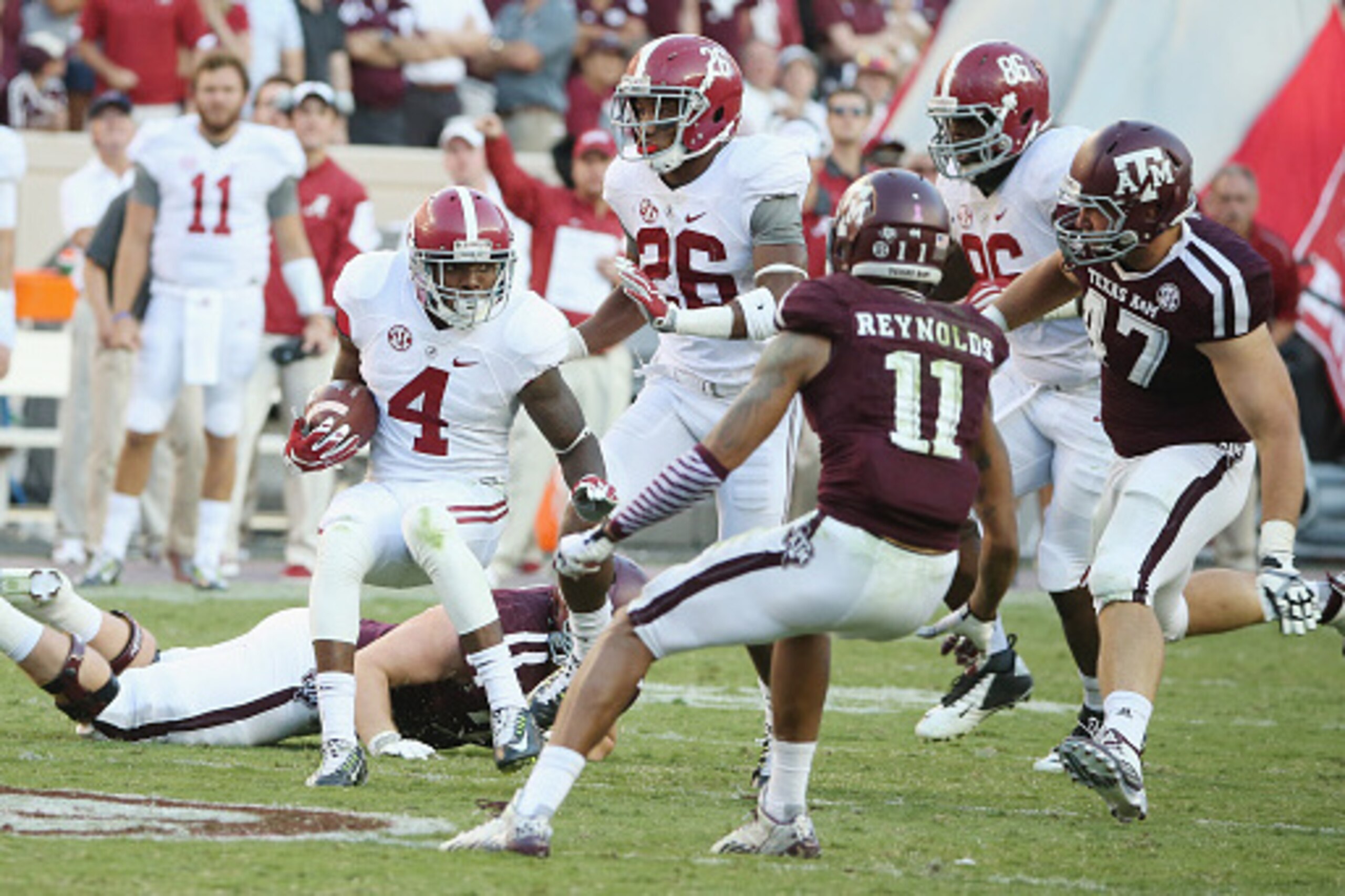 COLLEGE STATION, TX - OCTOBER 17:  Eddie Jackson #4 of the Alabama Crimson Tide runs with the football after an interception in the second half of their game against the Texas A&M Aggies at Kyle Field on October 17, 2015 in College Station, Texas.  (Photo