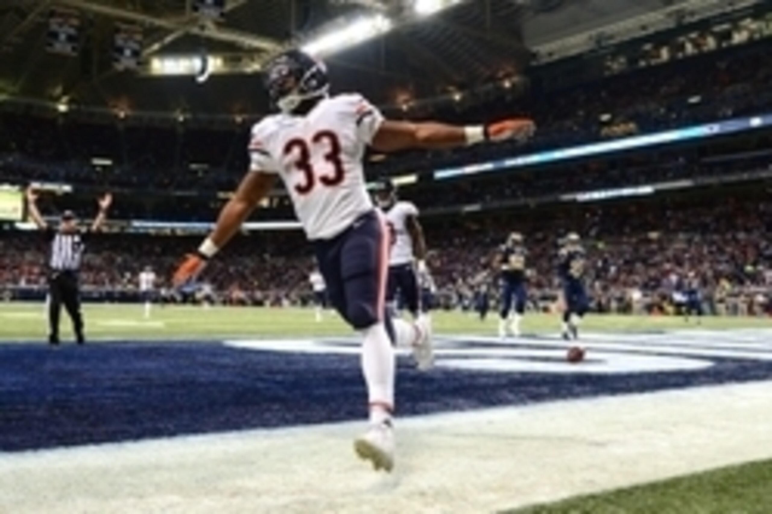 Nov 15, 2015; St. Louis, MO, USA; Chicago Bears running back Jeremy Langford (33) celebrates after scoring a 83 yard touchdown against the St. Louis Rams during the first half at the Edward Jones Dome. Mandatory Credit: Jeff Curry-USA TODAY Sports