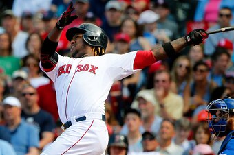 BOSTON, MA - JUNE 14:  Hanley Ramirez #13 of the Boston Red Sox swings during the ninth inning of the Toronto Blue Jays 13-5 win over the Boston Red Sox in a game at Fenway Park on June 14, 2015 in Boston, Massachusetts.  (Photo by Winslow Townson/Getty I