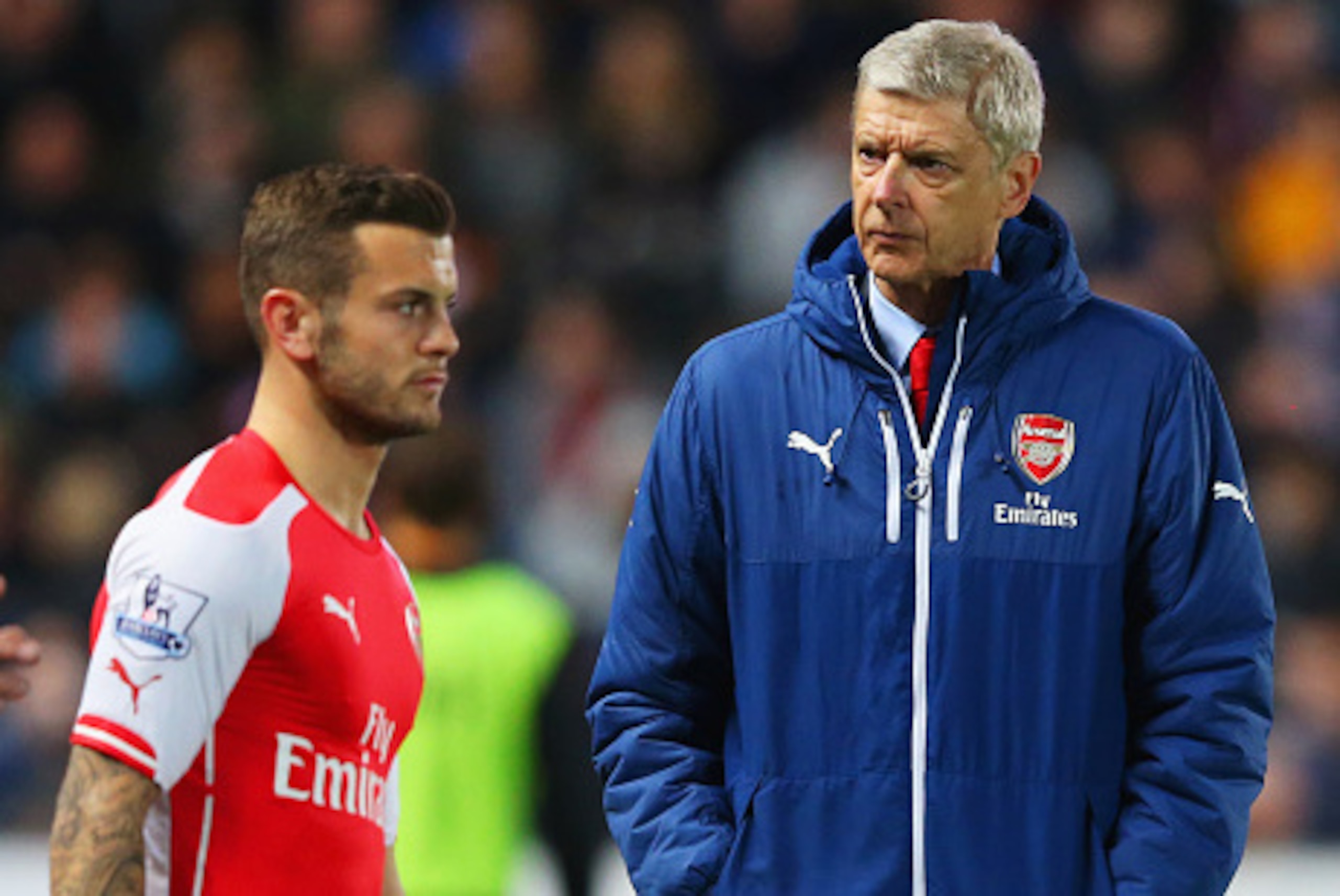 HULL, ENGLAND - MAY 04:  Arsene Wenger manager of Arsenal looks on as Jack Wilshere of Arsenal prepares to come onto the pitch during the Barclays Premier League match between Hull City and Arsenal at KC Stadium on May 4, 2015 in Hull, England.  (Photo by