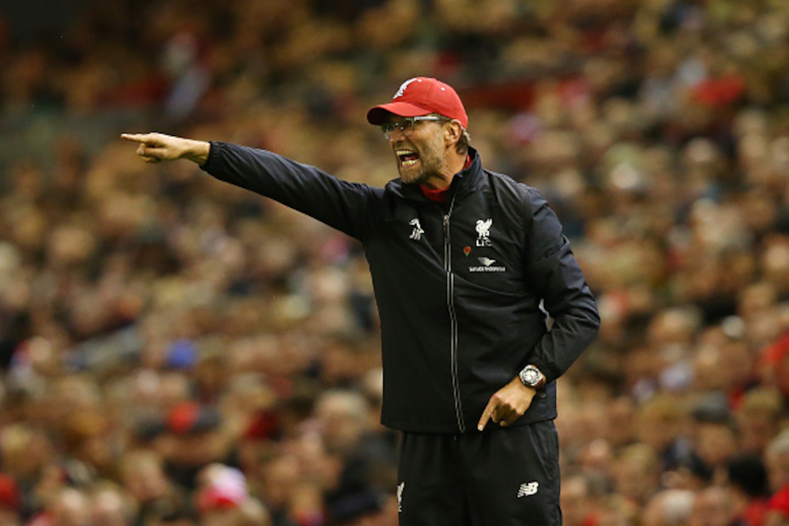 LIVERPOOL, ENGLAND - NOVEMBER 08:  Jurgen Klopp, Manager of Liverpool gestures to his players during the Barclays Premier League match between Liverpool and Crystal Palace at Anfield on November 8, 2015 in Liverpool, England.  (Photo by Alex Livesey/Getty
