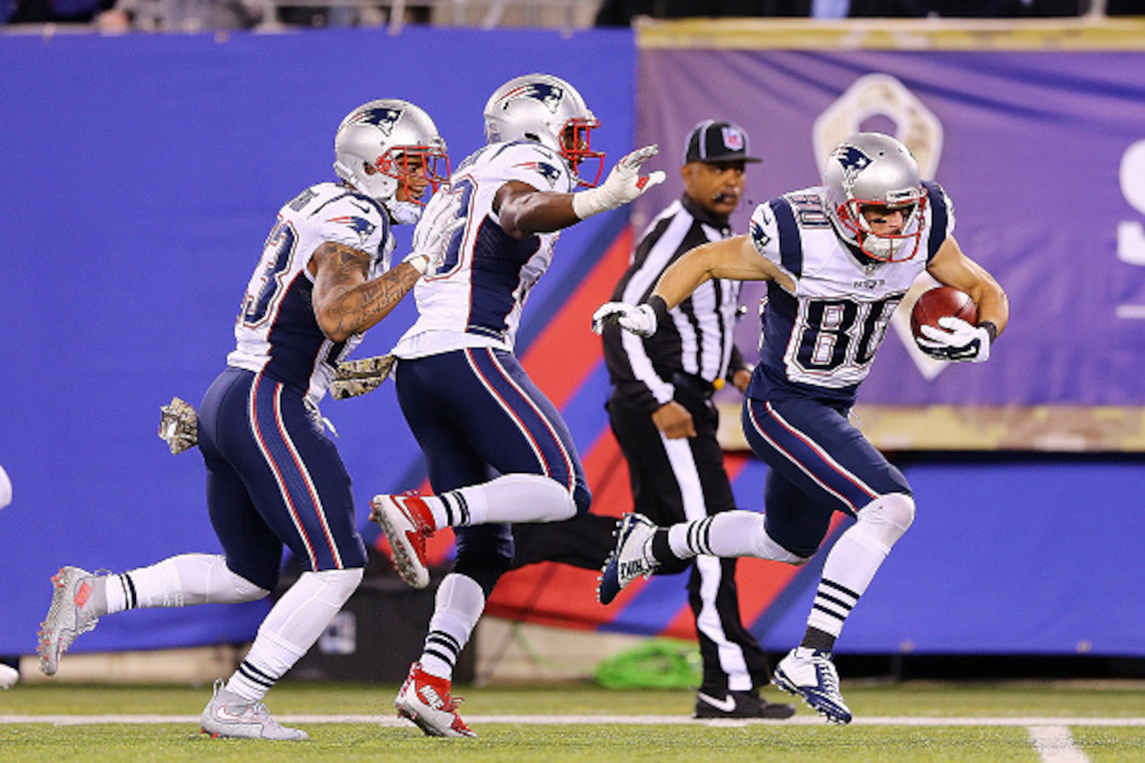 EAST RUTHERFORD, NJ - NOVEMBER 15: Danny Amendola #80 of the New England Patriots is tripped up shy of the endzone by his own teammate Duron Harmon #30 against the New York Giants during the third quarter at MetLife Stadium on November 15, 2015 in East Ru