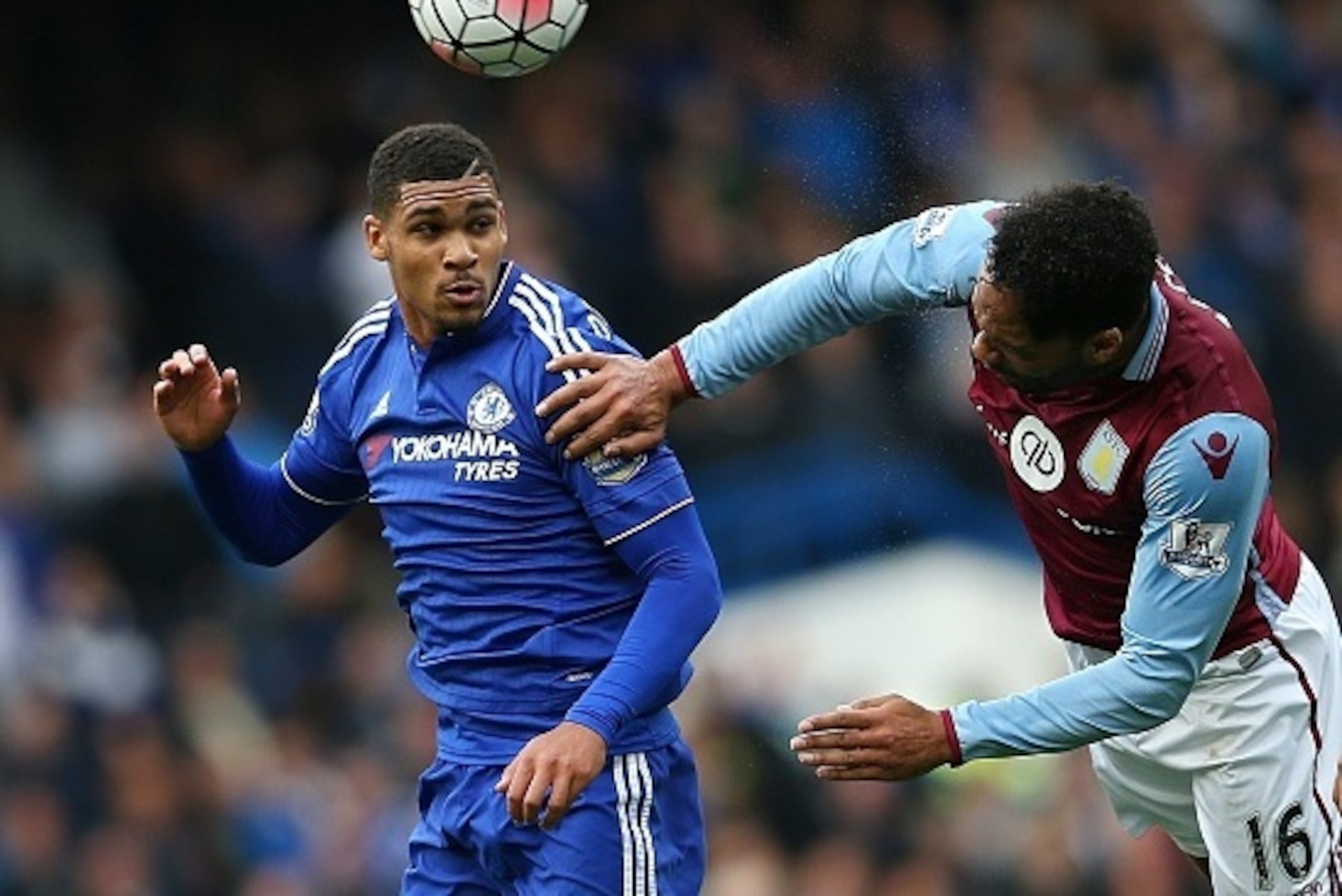 Aston Villa's English defender Joleon Lescott (R) vies for the ball against Chelsea's English midfielder Ruben Loftus-Cheek during the English Premier League football match between Chelsea and Aston Villa at Stamford Bridge in London on October 17, 2015. 