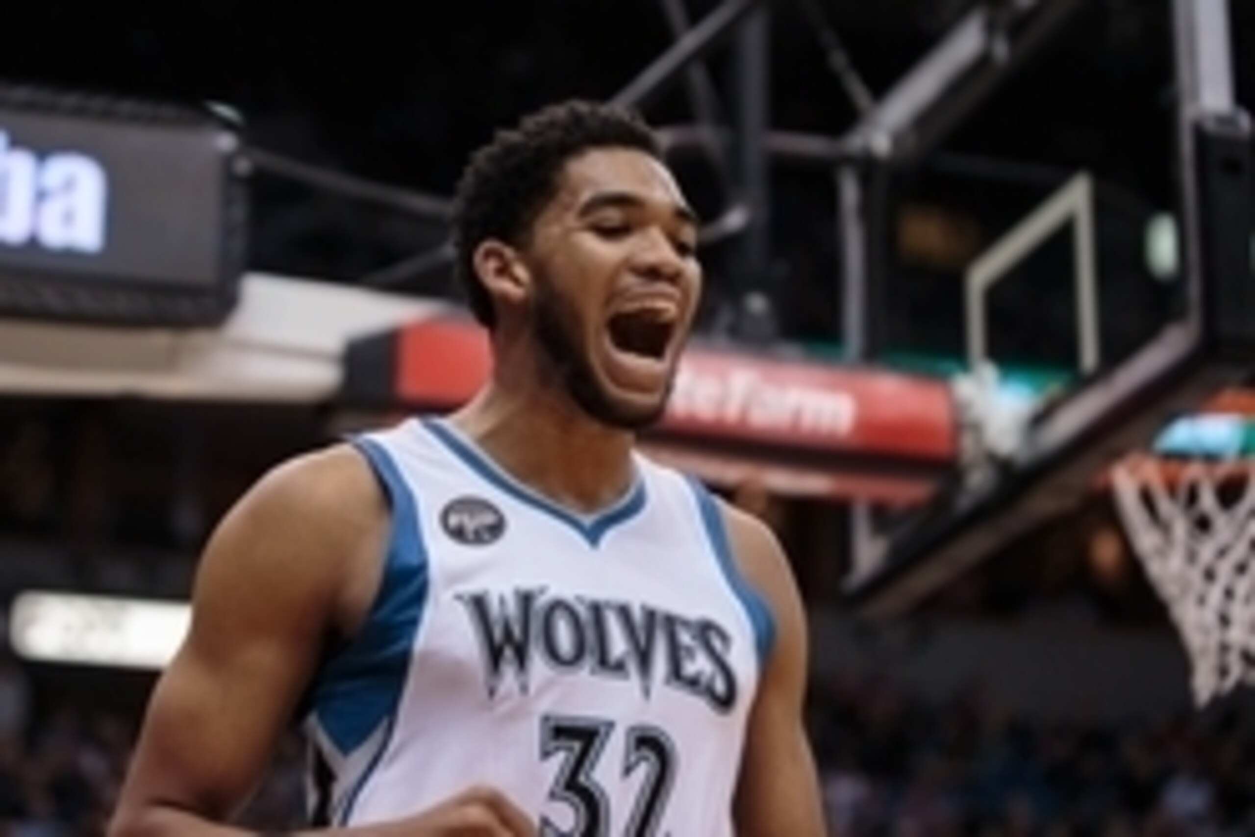 Nov 12, 2015; Minneapolis, MN, USA; Minnesota Timberwolves center Karl-Anthony Towns (32) reacts to a foul in the first quarter against the Golden State Warriors at Target Center. Mandatory Credit: Brad Rempel-USA TODAY Sports