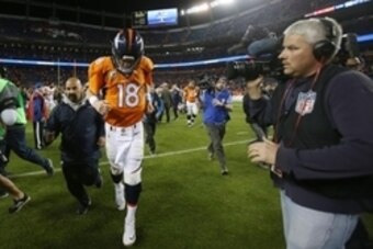 Nov 15, 2015; Denver, CO, USA; Denver Broncos quarterback Peyton Manning (18) walks off the field after the game against the Kansas City Chiefs at Sports Authority Field at Mile High. The Chiefs won 29-13. Mandatory Credit: Chris Humphreys-USA TODAY Sport