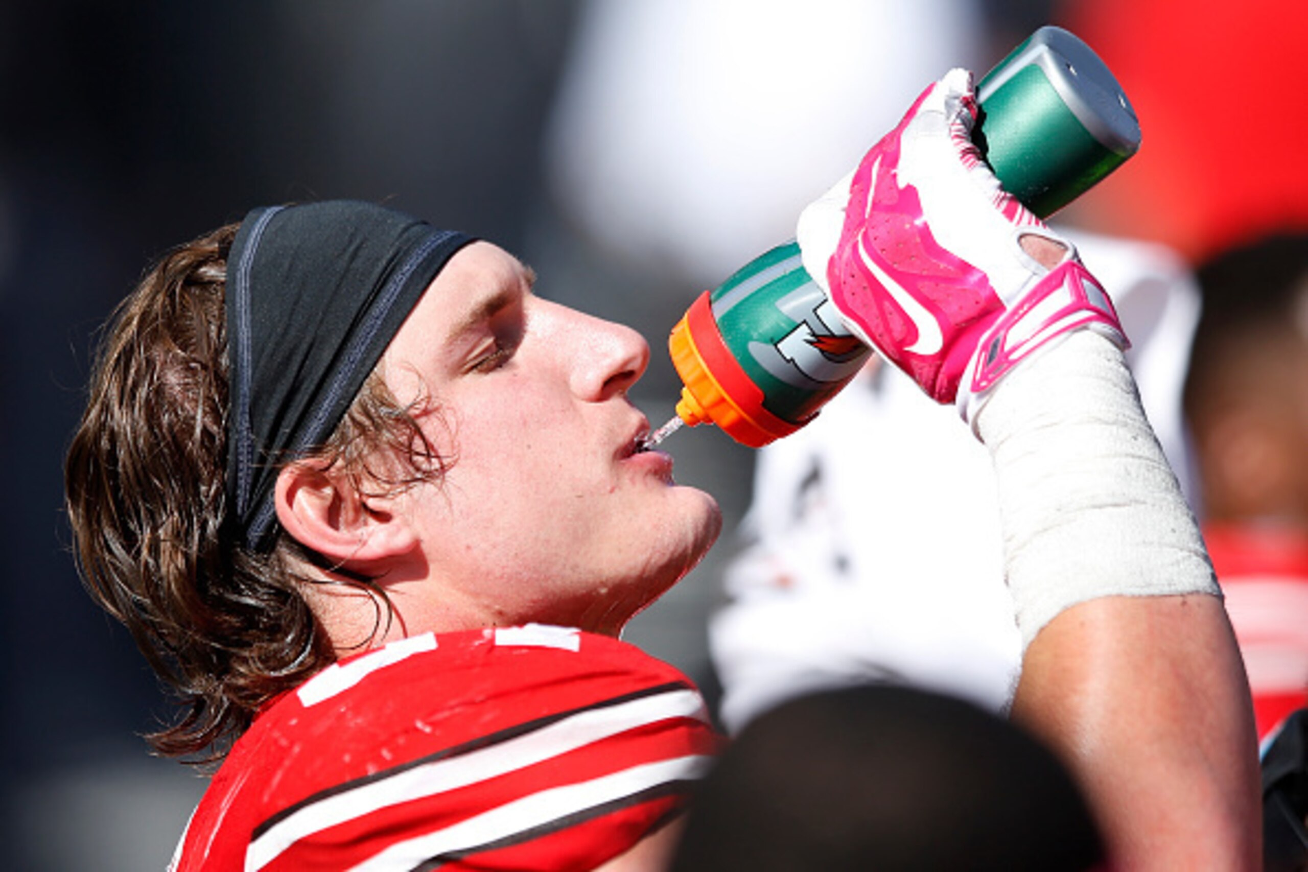 COLUMBUS, OH - OCTOBER 10: Joey Bosa #97 of the Ohio State Buckeyes takes a drink while on the sideline against the Maryland Terrapins during a game at Ohio Stadium on October 10, 2015 in Columbus, Ohio. The Buckeyes defeated the Terrapins 49-28. (Photo b