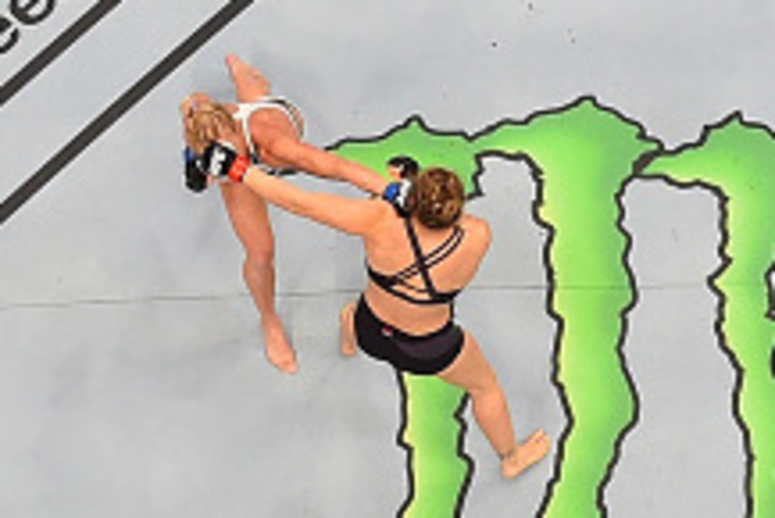MELBOURNE, AUSTRALIA - NOVEMBER 15:  An overhead view of the Octagon as Holly Holm punches Ronda Rousey in their UFC women's bantamweight championship bout during the UFC 193 event at Etihad Stadium on November 15, 2015 in Melbourne, Australia. (Photo by 